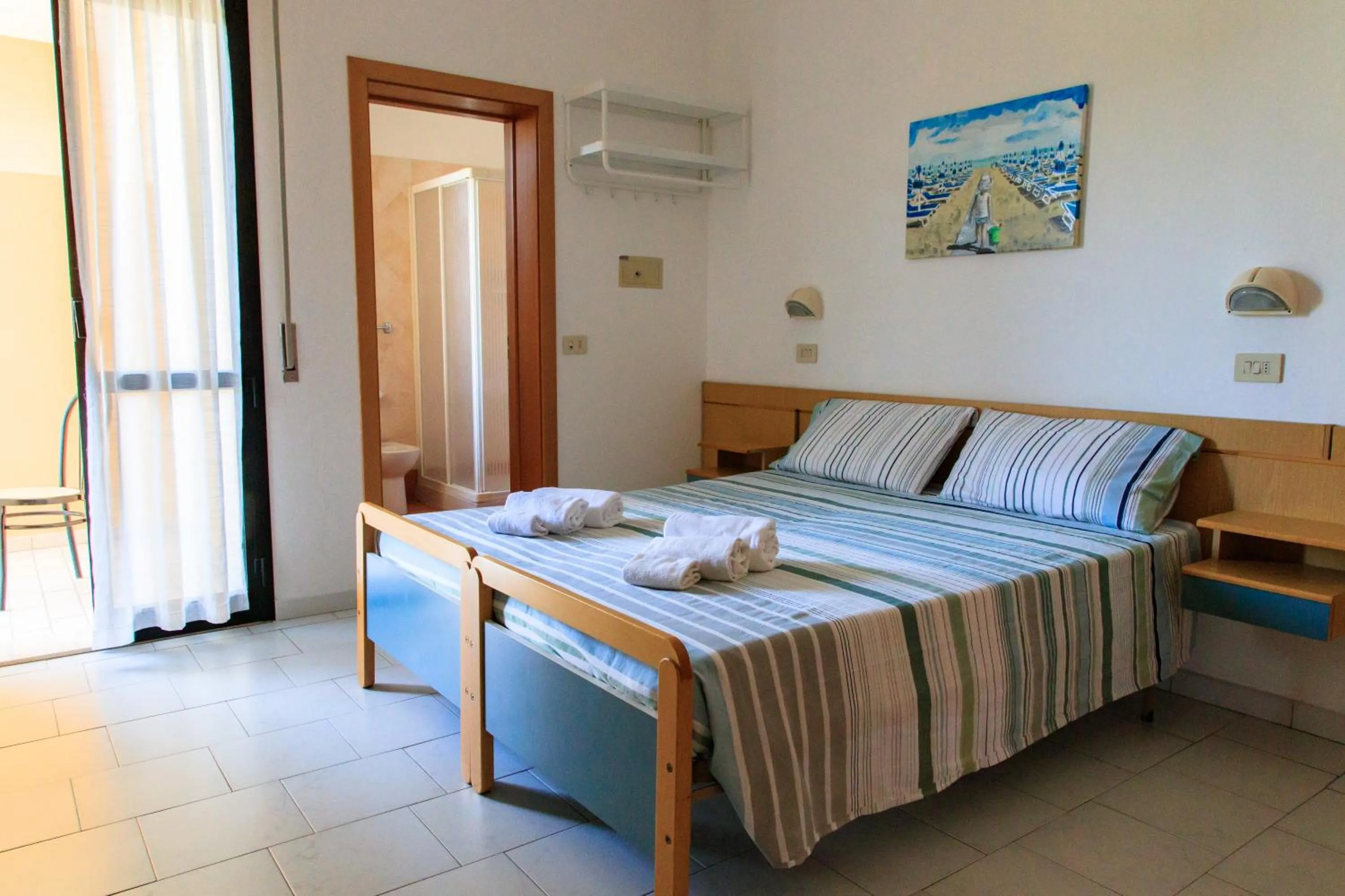 Bathroom, Bed in Hotel Riziana