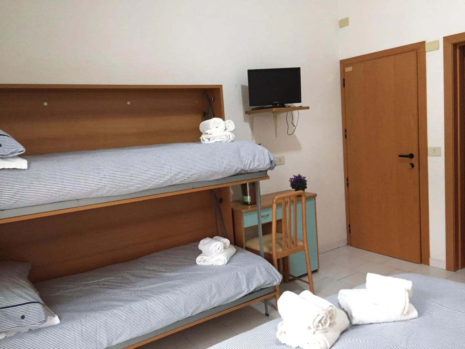 Bed in Hotel Riziana