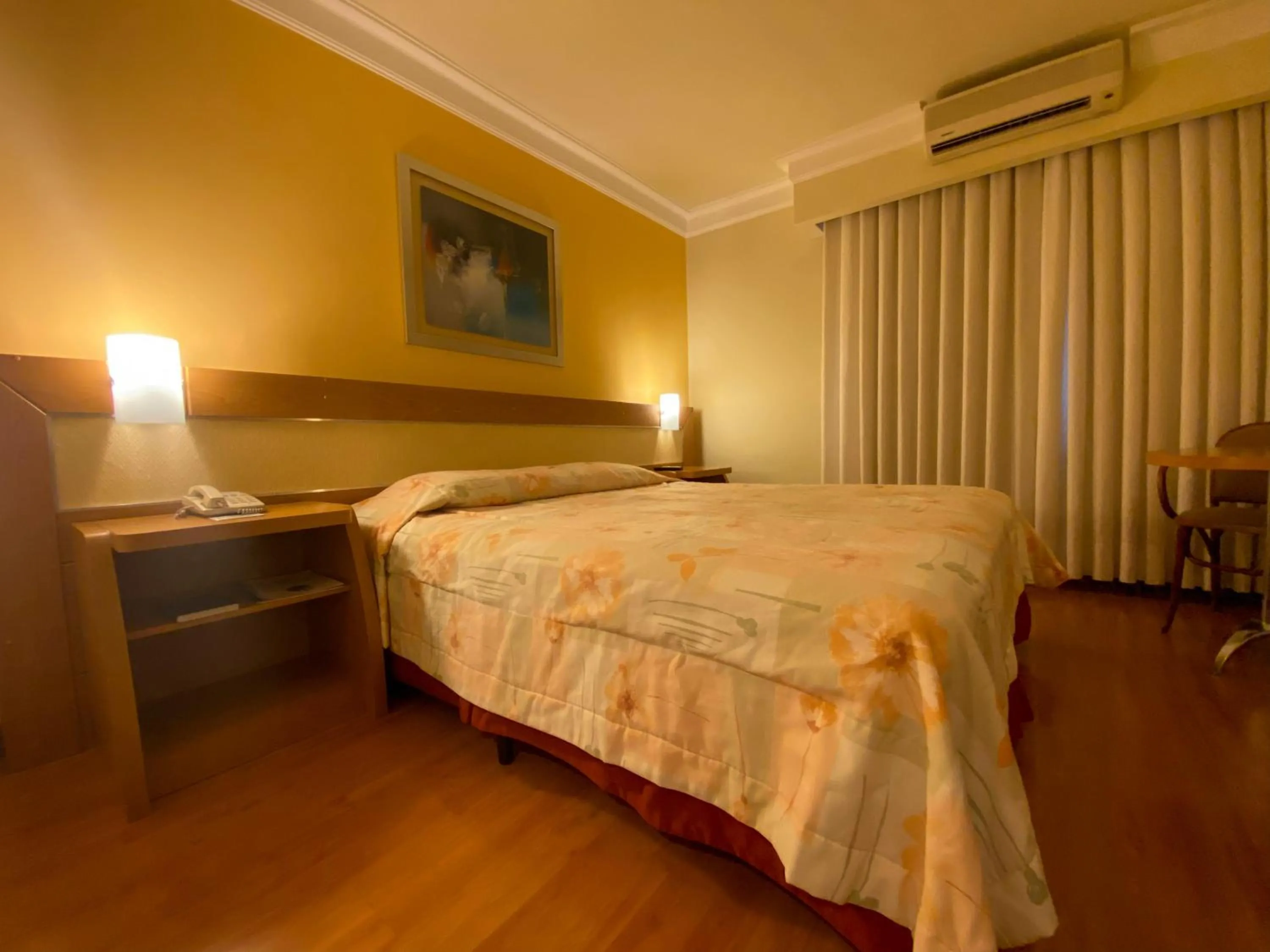 Bed in Itatiaia Hotel Passo Fundo