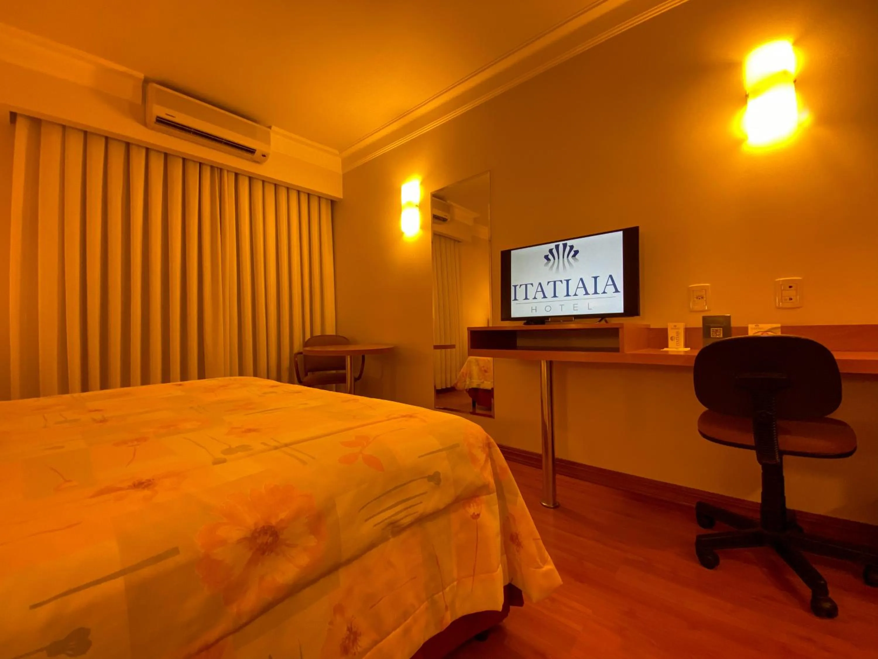 Photo of the whole room, Bed in Itatiaia Hotel Passo Fundo