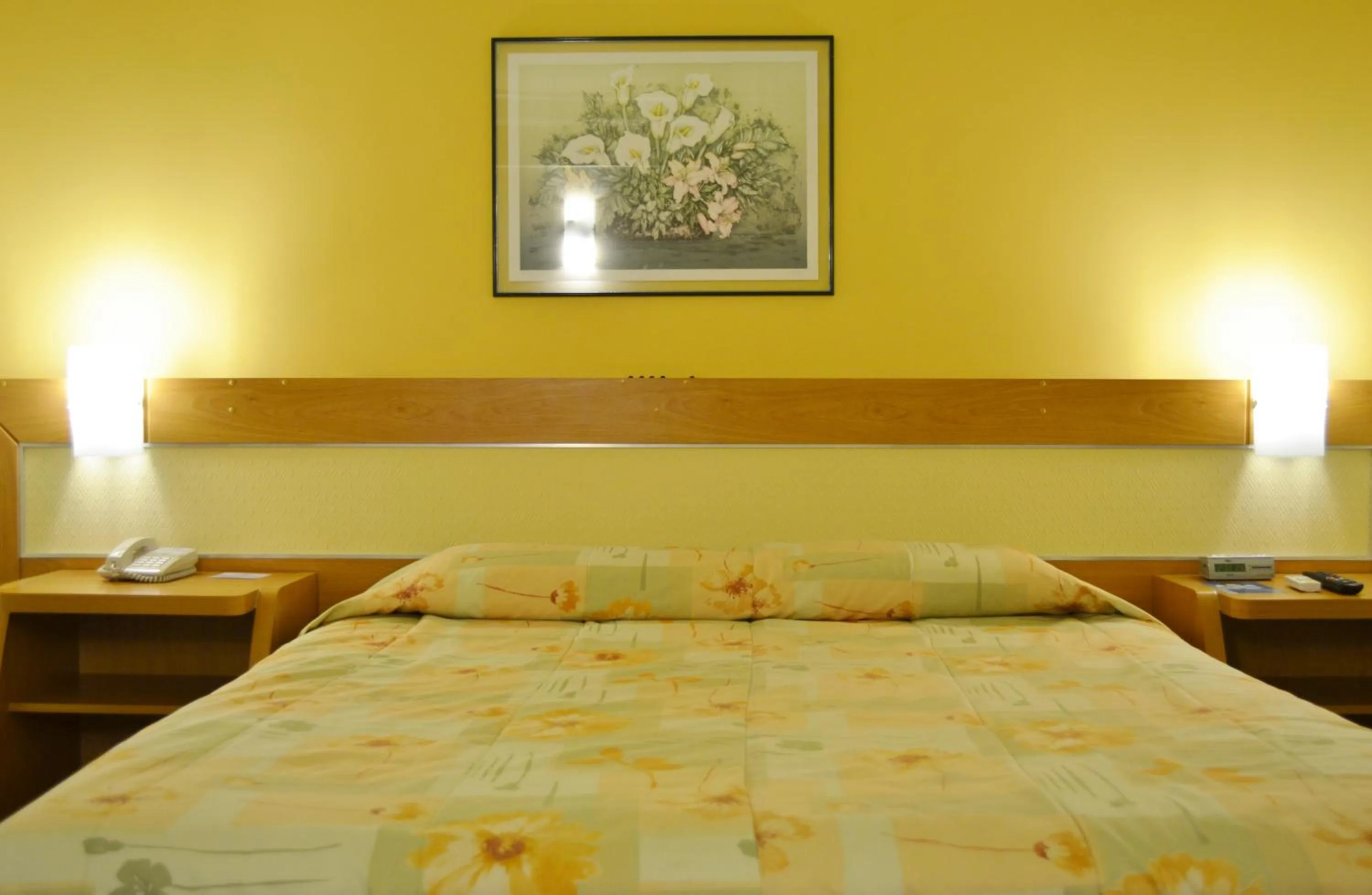 Bed in Itatiaia Hotel Passo Fundo