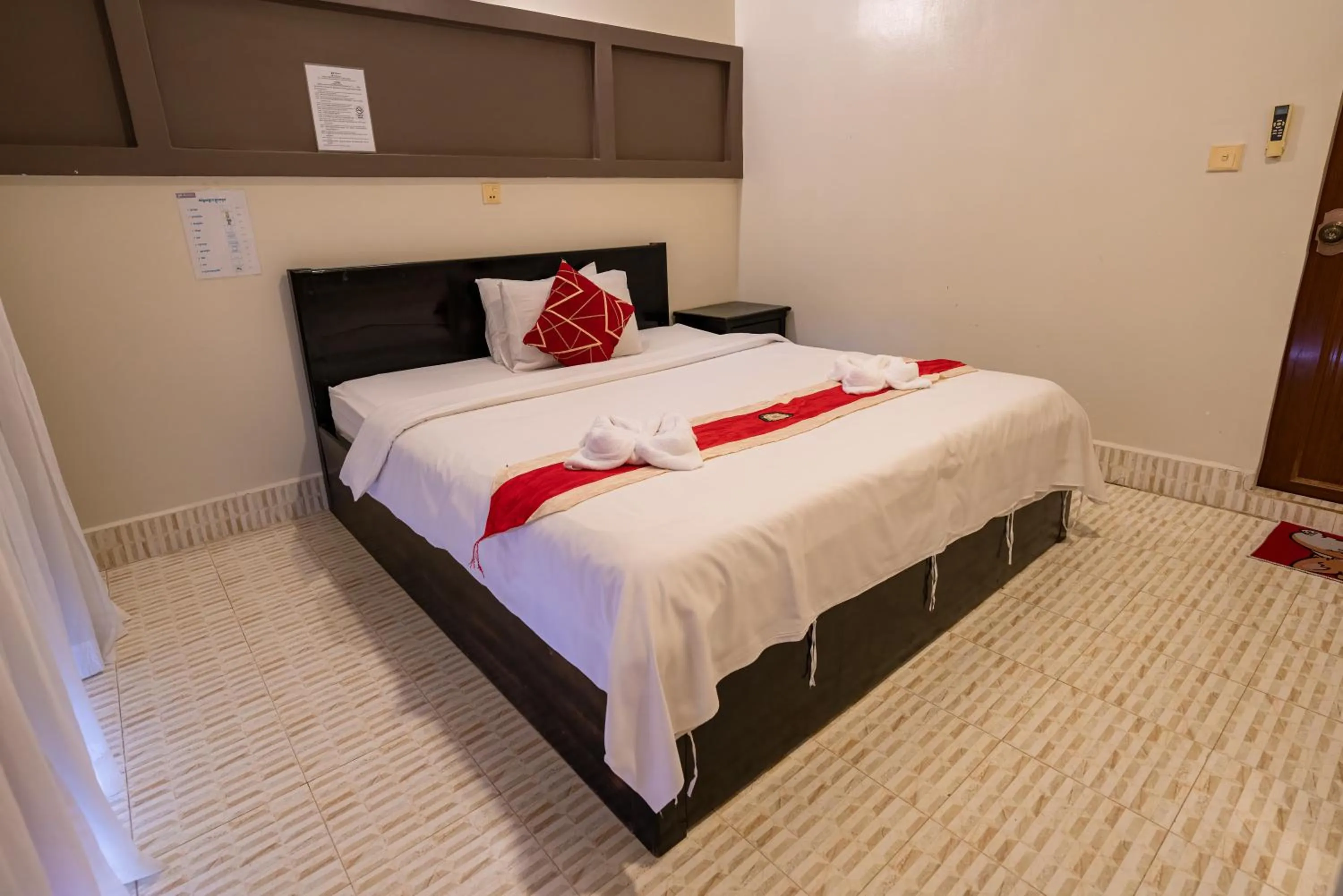 Bed in Hello Kampot Resort