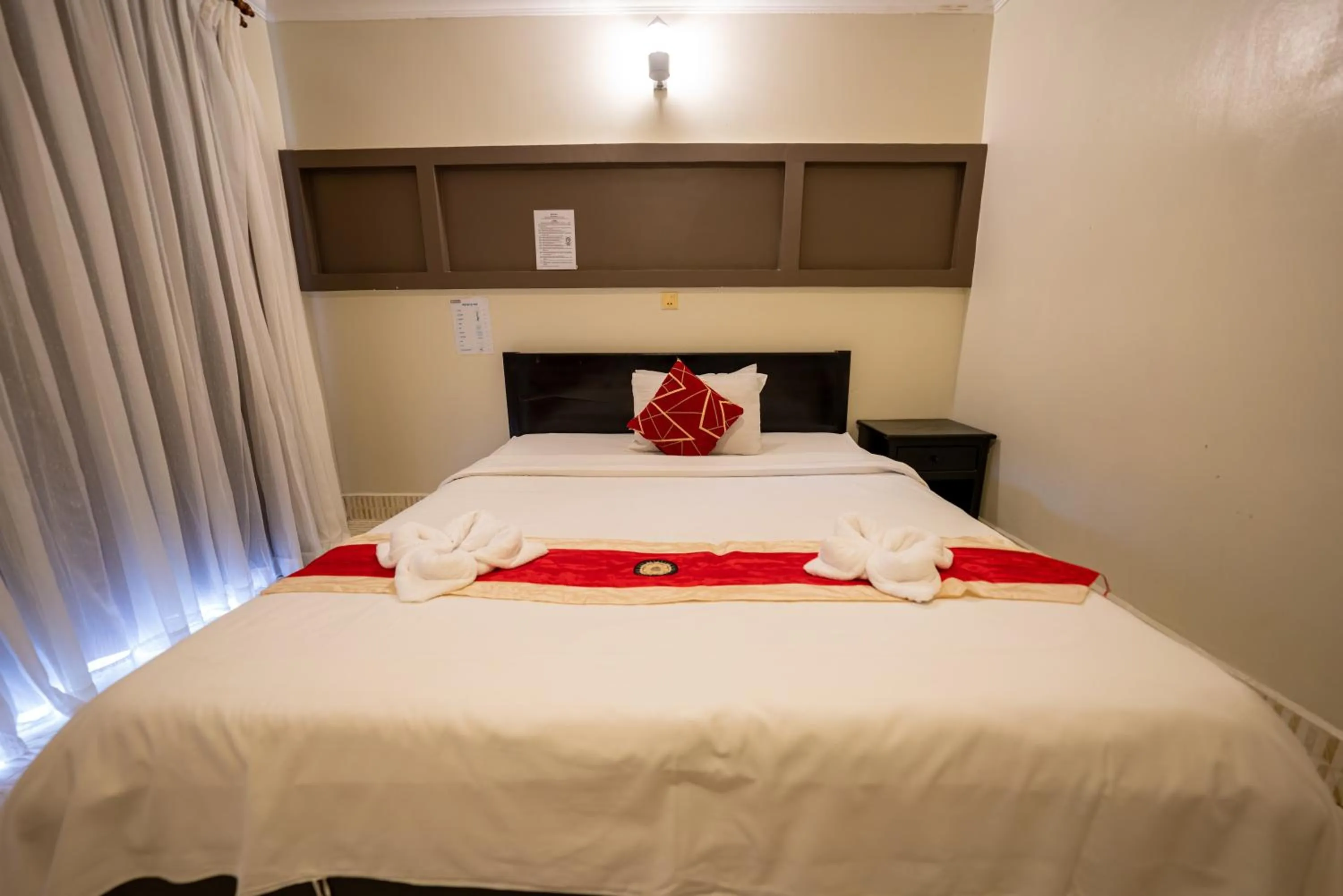 Bed in Hello Kampot Resort