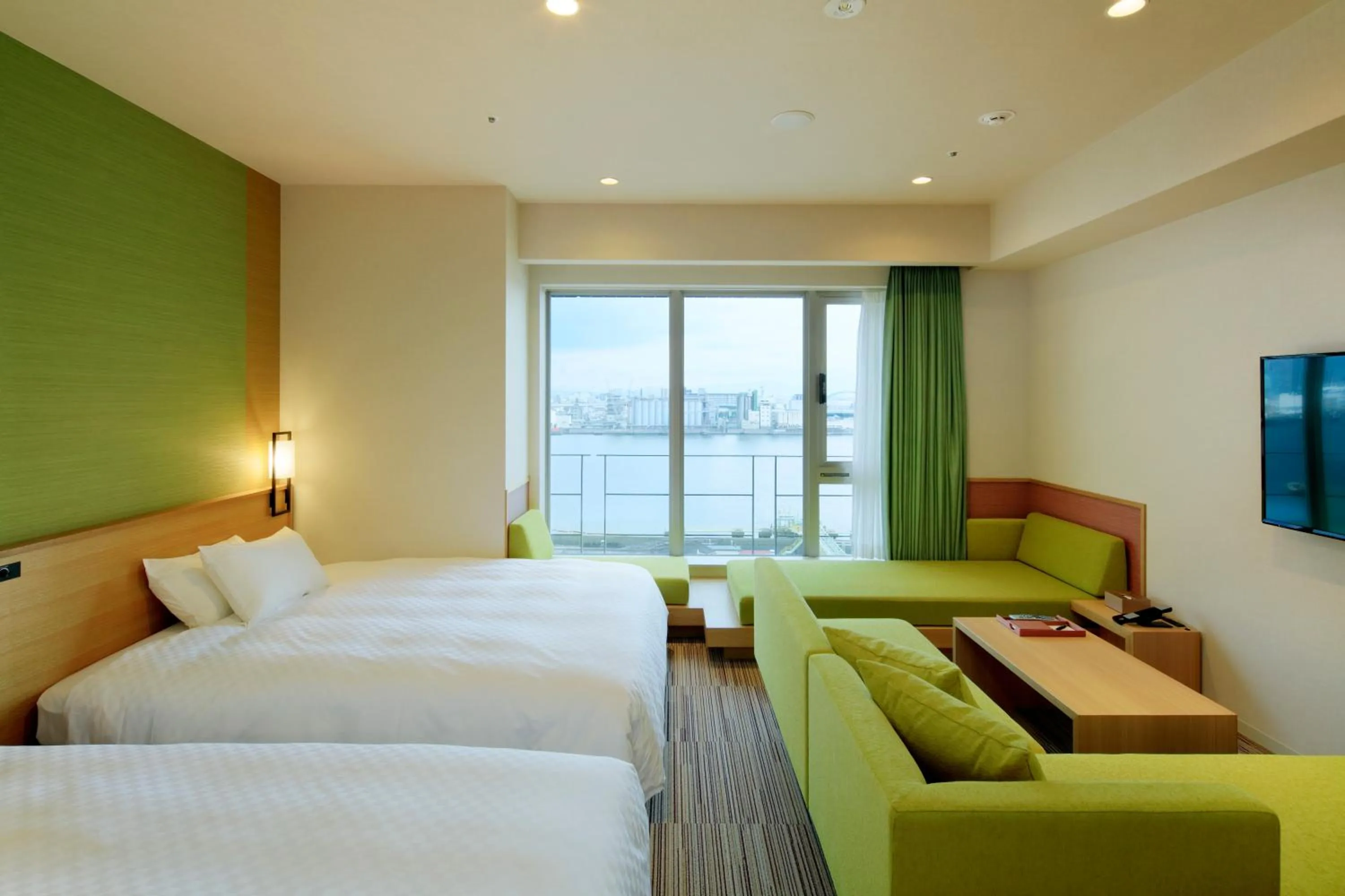 Bed in THE SINGULARI HOTEL & SKYSPA at UNIVERSAL STUDIOS JAPAN