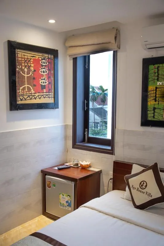 Bed in Ngo House Villa