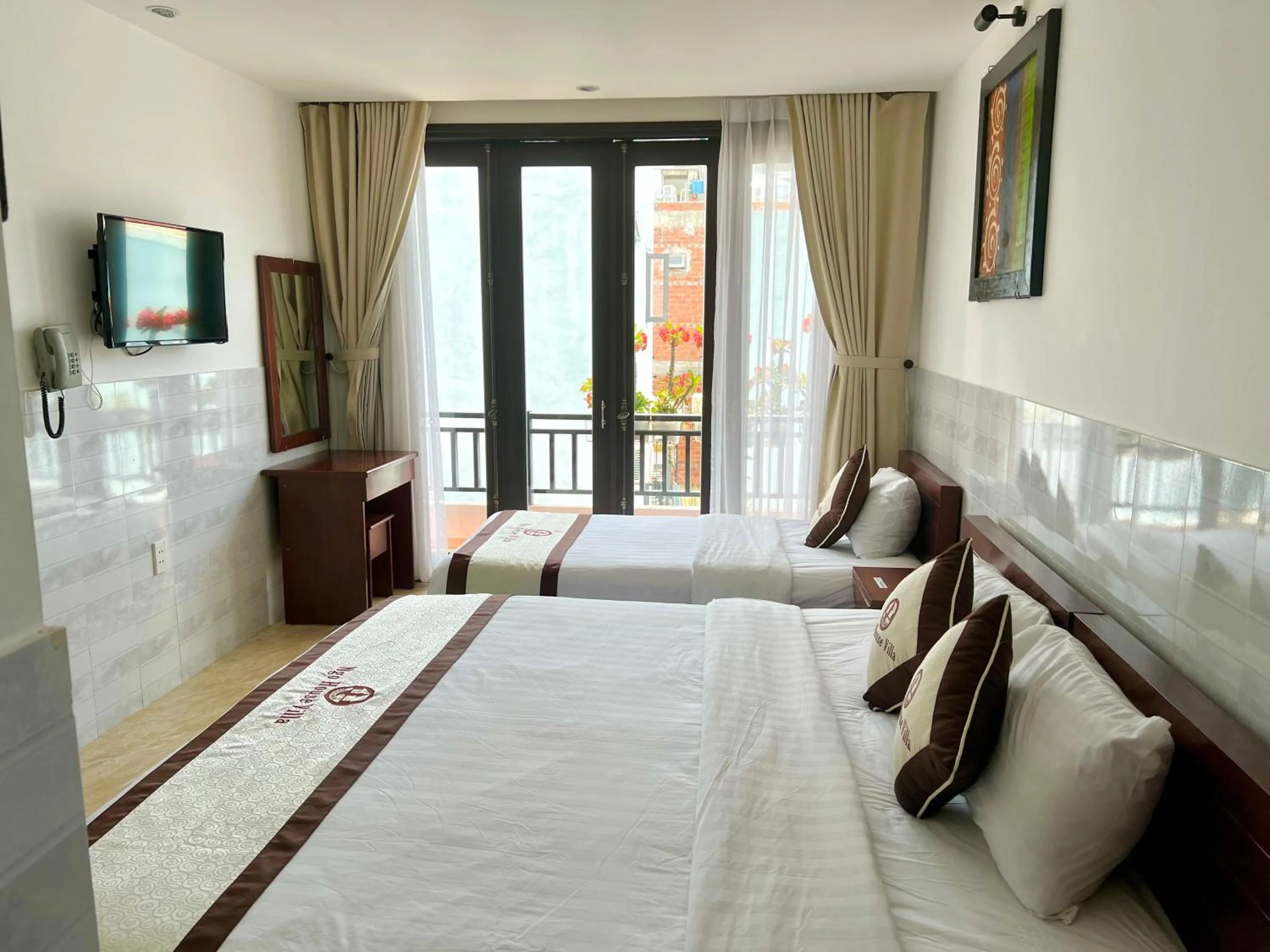 Bed in Ngo House Villa