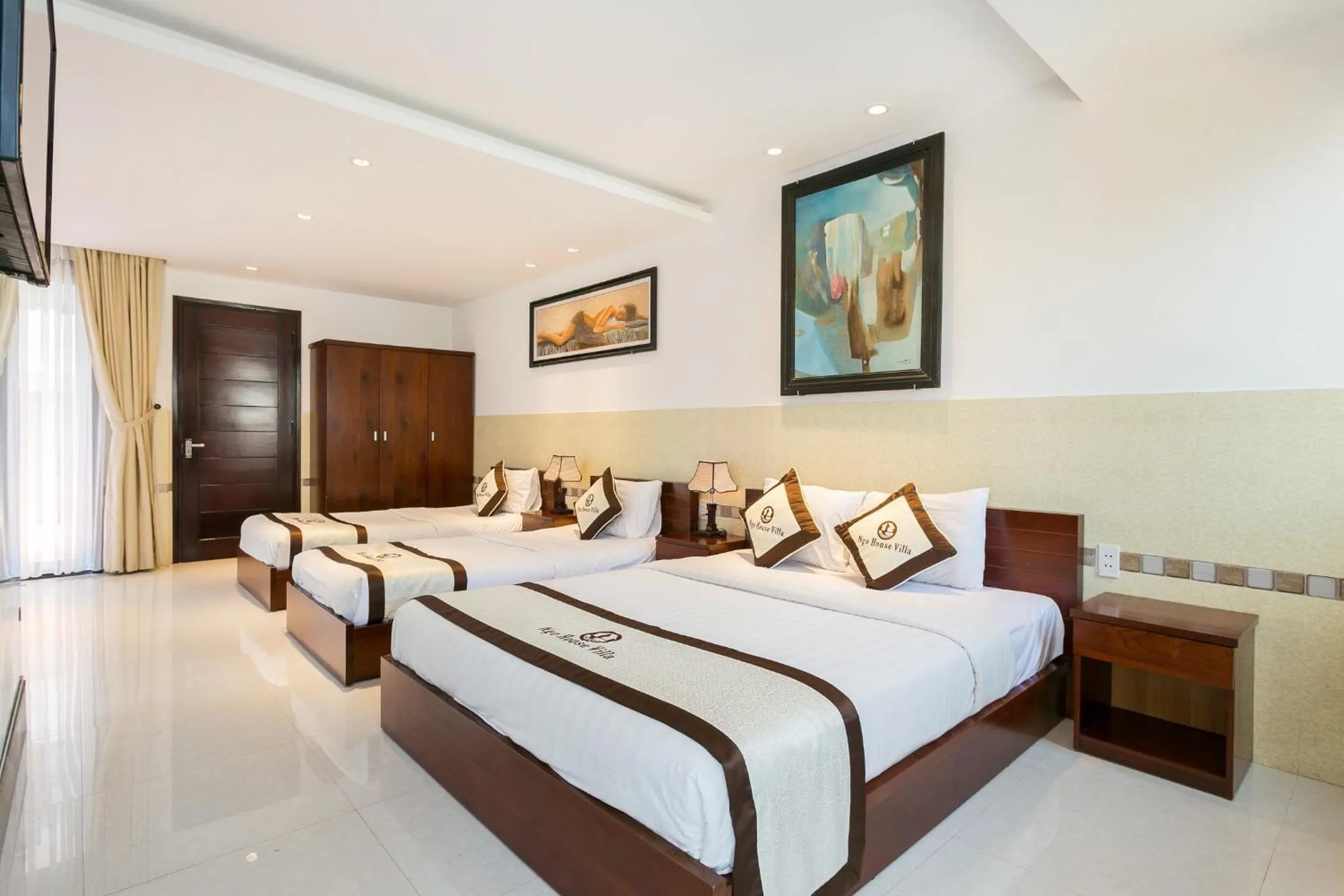 Bed in Ngo House Villa