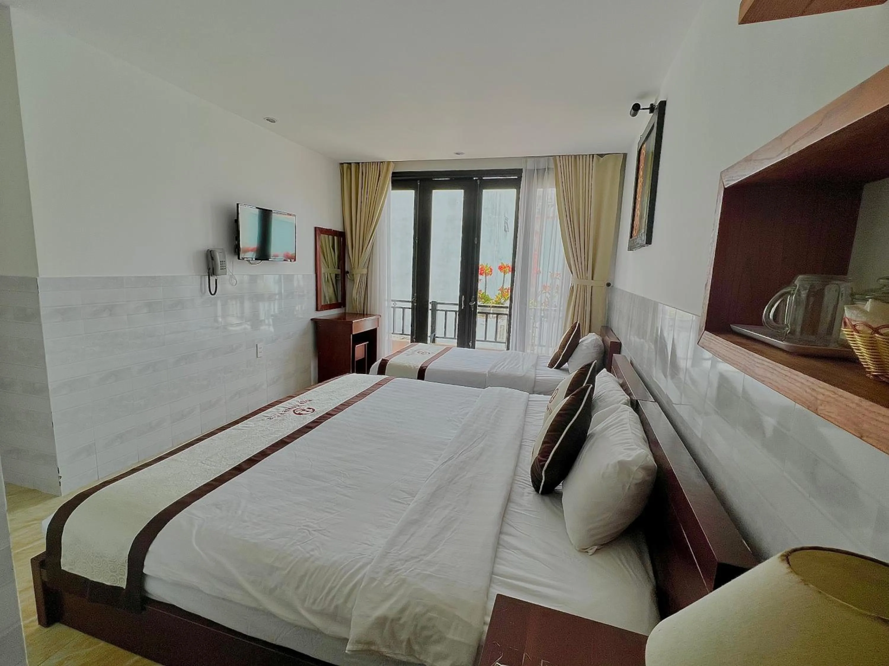 Bed in Ngo House Villa