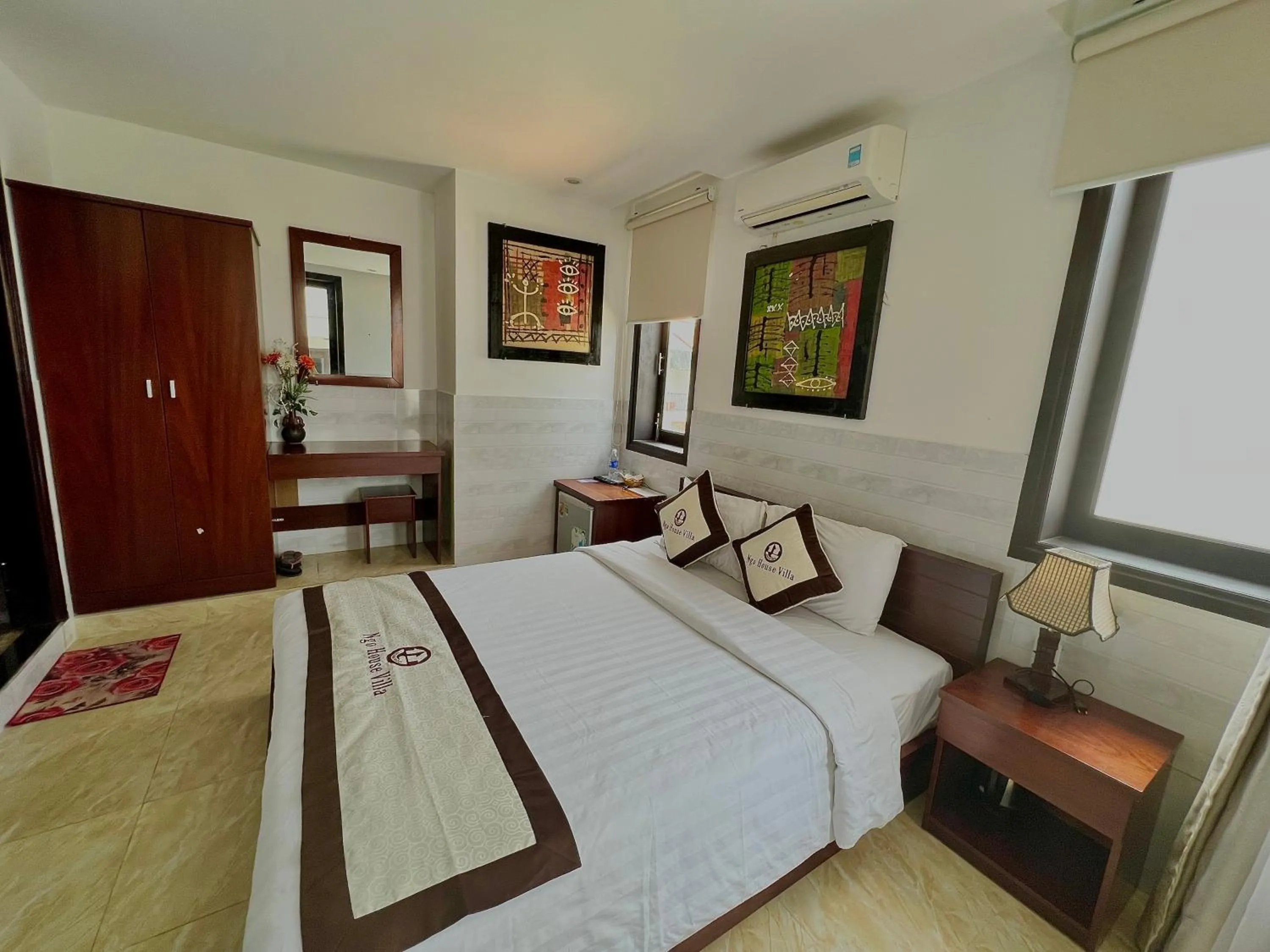 Bed in Ngo House Villa