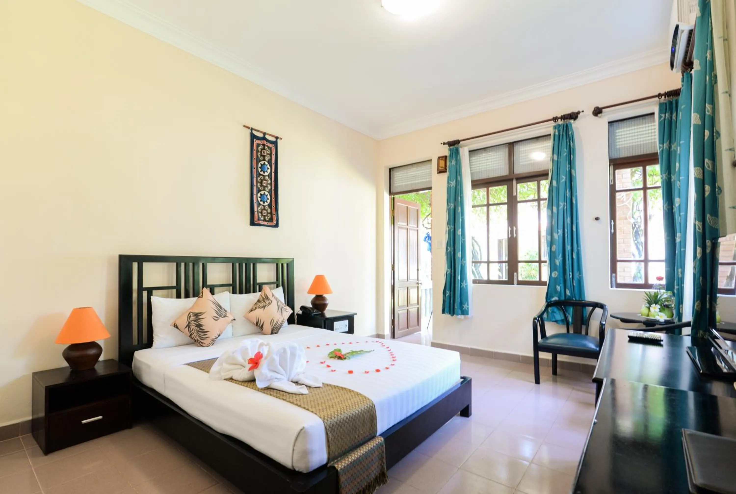 Photo of the whole room, Bed in Four Oceans Beach Resort - Bon Bien Mui Ne