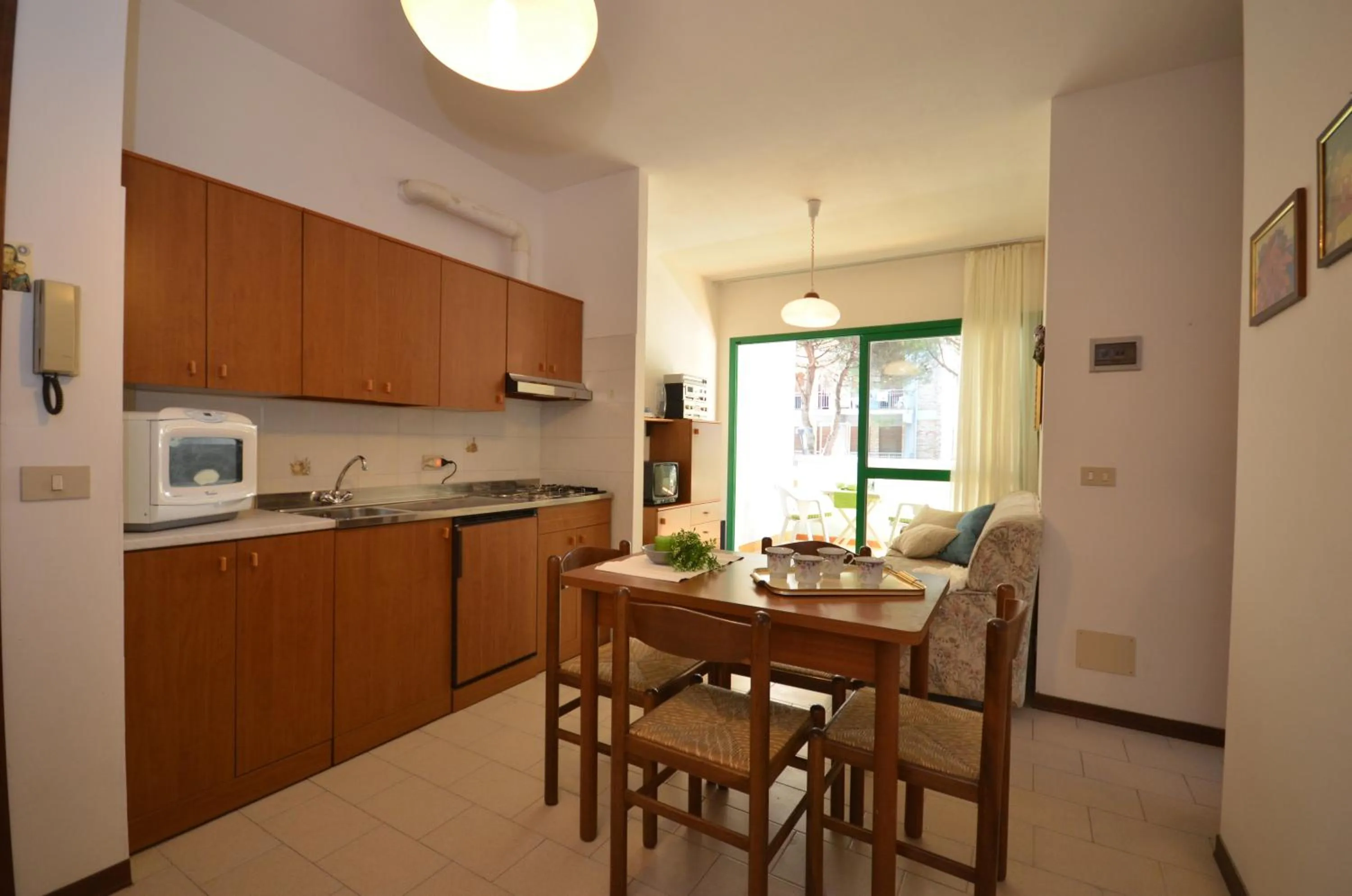 Kitchen or kitchenette in Appartamenti Acquaverde
