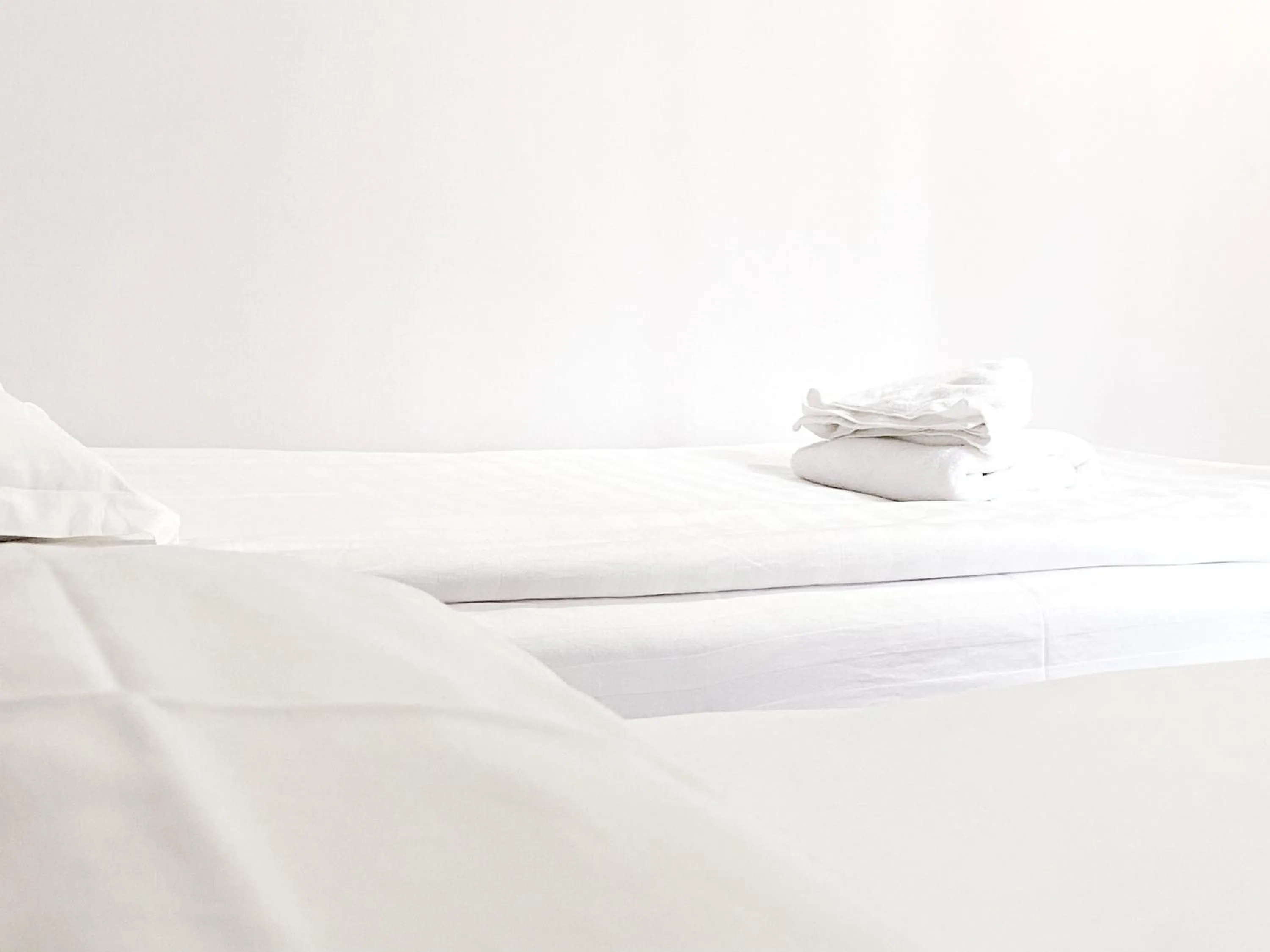 Bed in TourAsia Hotel