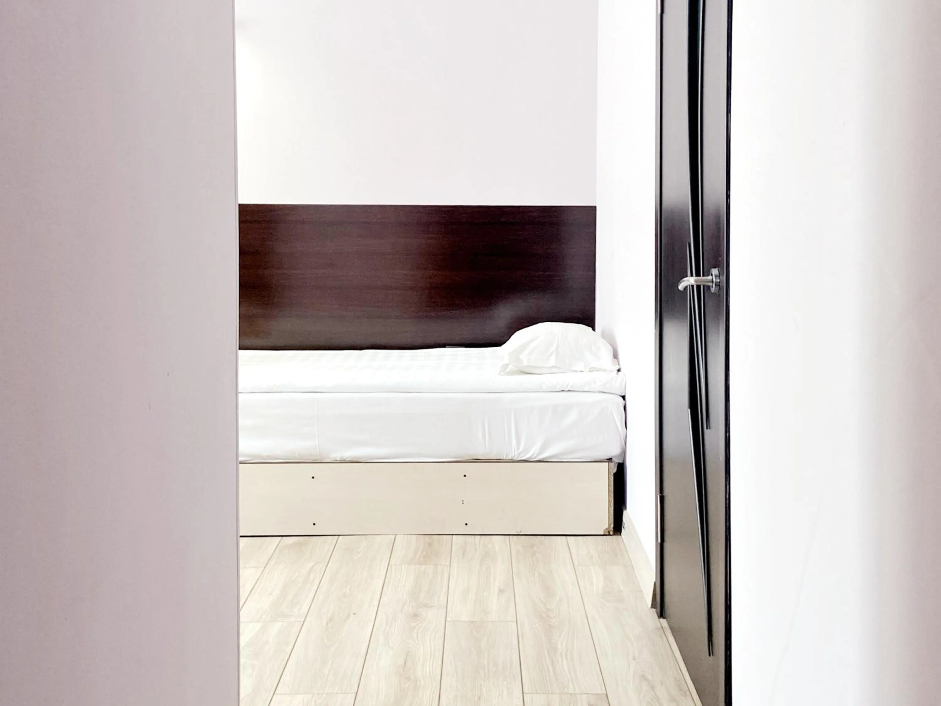 Bed in TourAsia Hotel