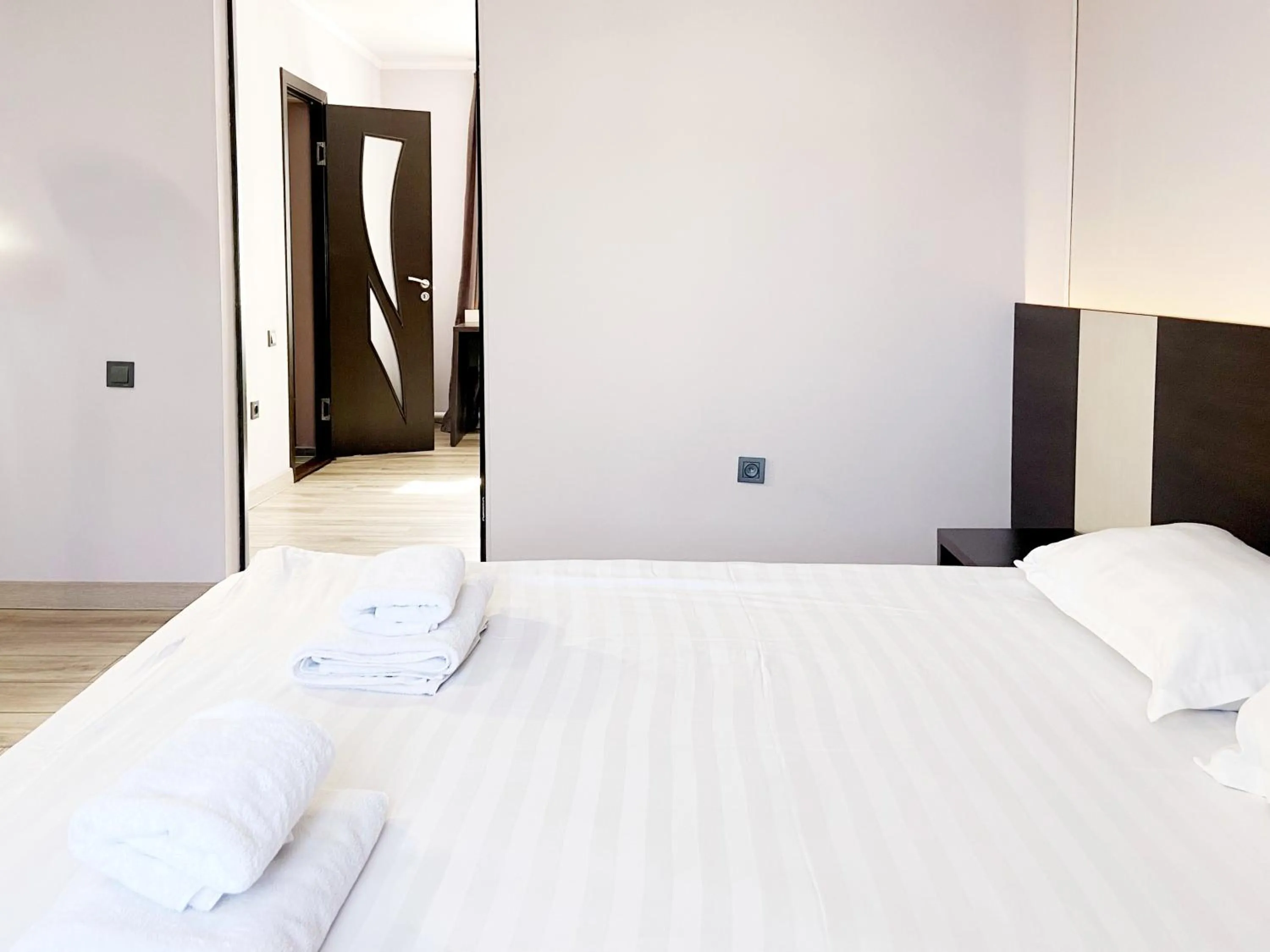 Bed in TourAsia Hotel