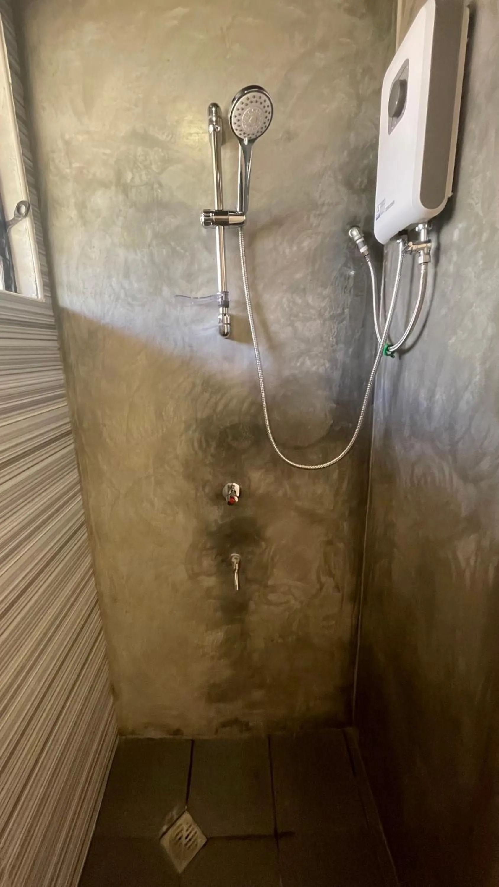 Shower in Footprints Beach Resort