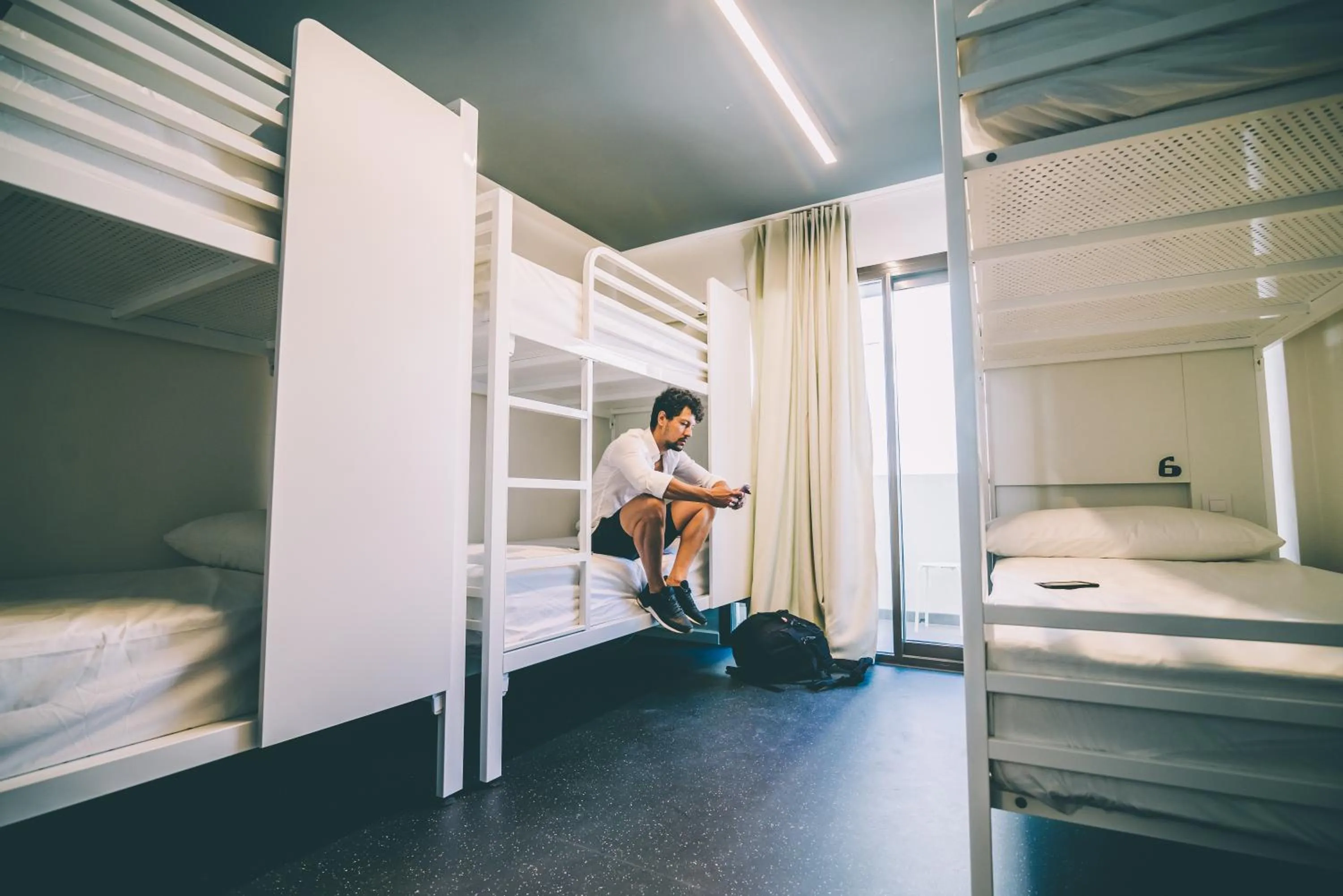 People, Bed in AMISTAT Island Hostel Ibiza - ALBERGUE JUVENIL