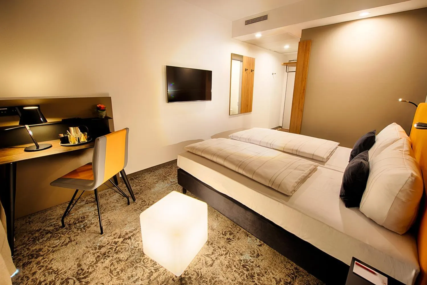 Photo of the whole room, Bed in LOGINN Hotel Leipzig