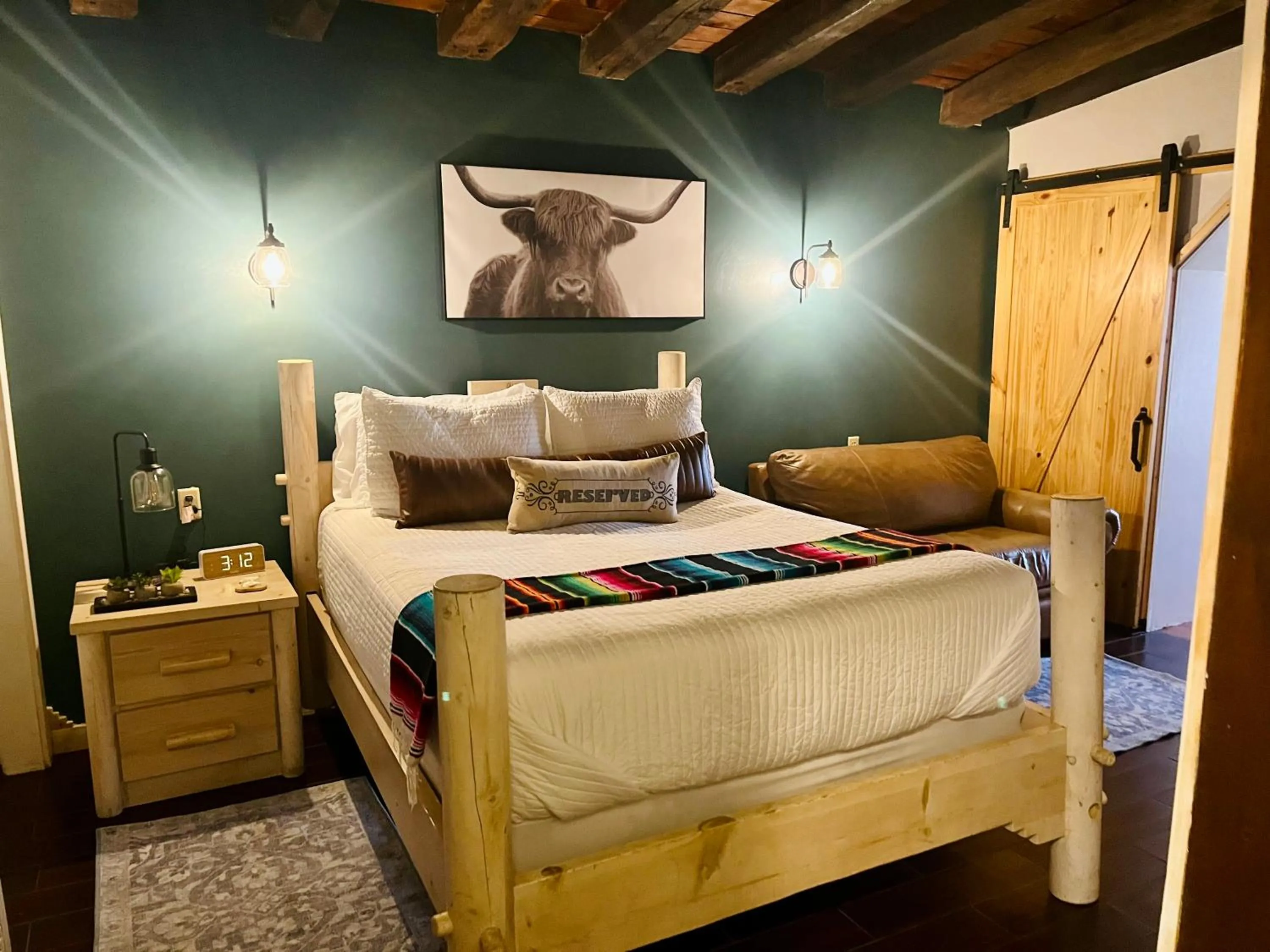 Bed in Adobe Rose Boutique Inn