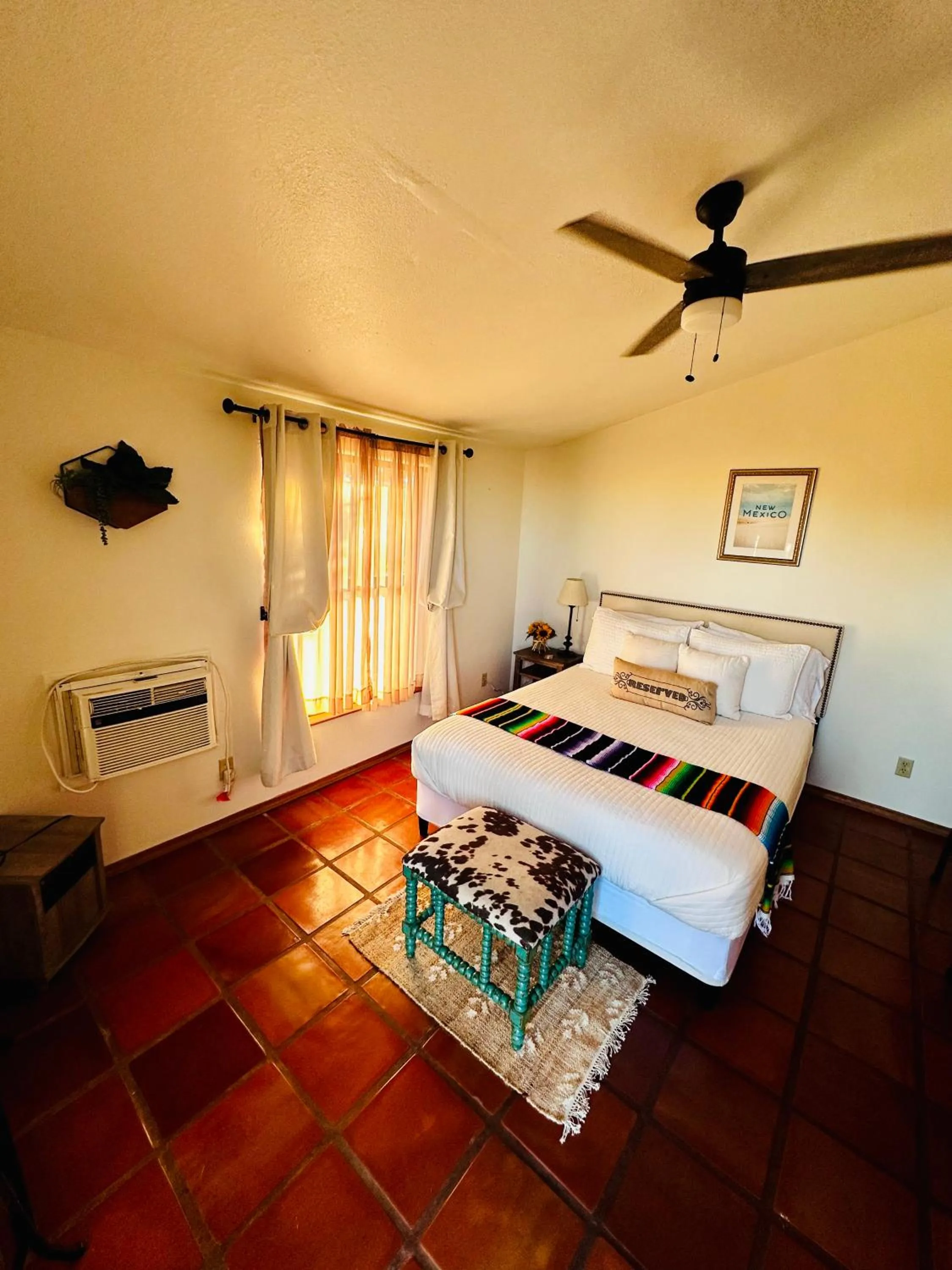 Bed in Adobe Rose Boutique Inn