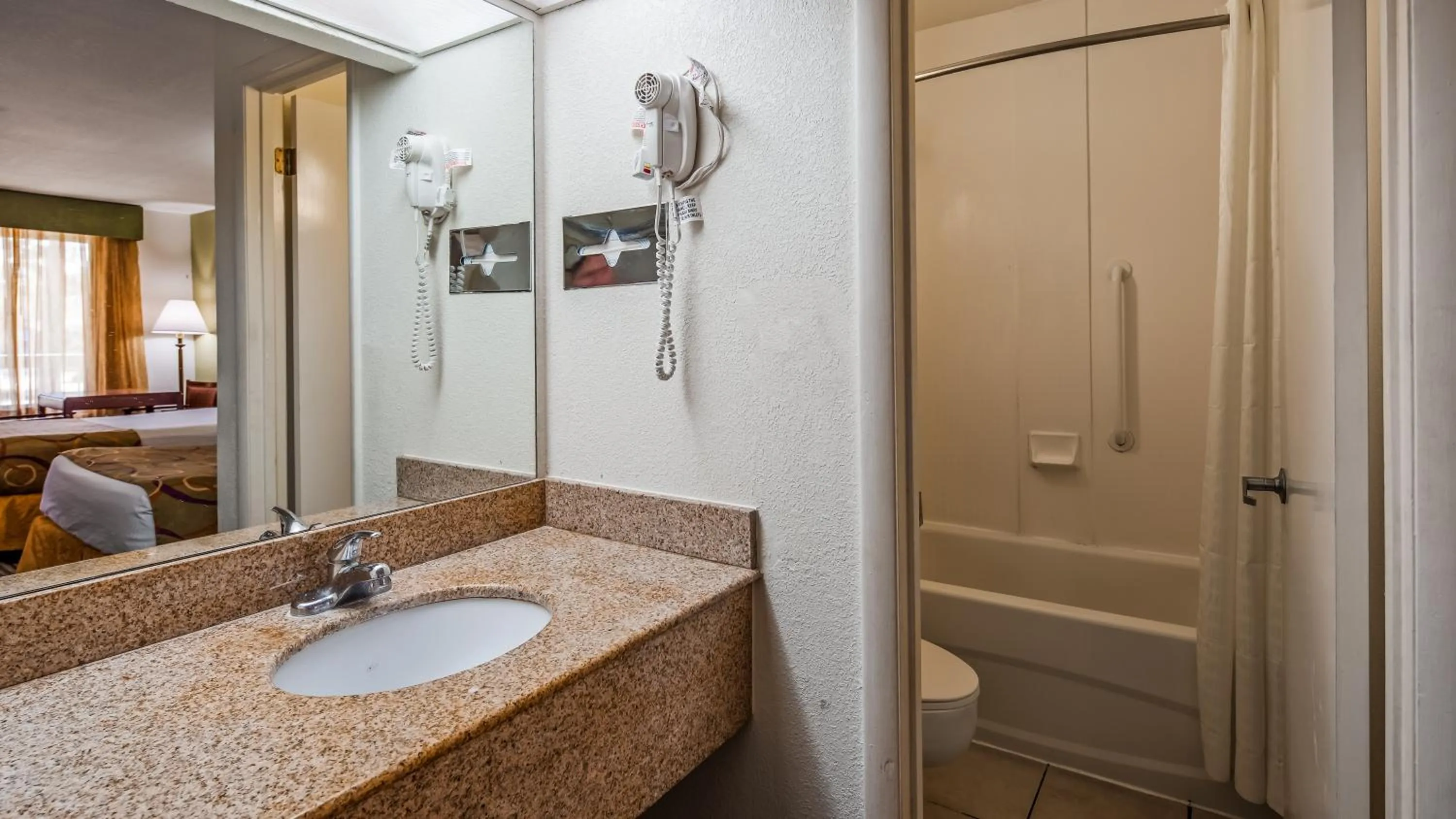 Bathroom in Ramada by Wyndham Savannah Gateway