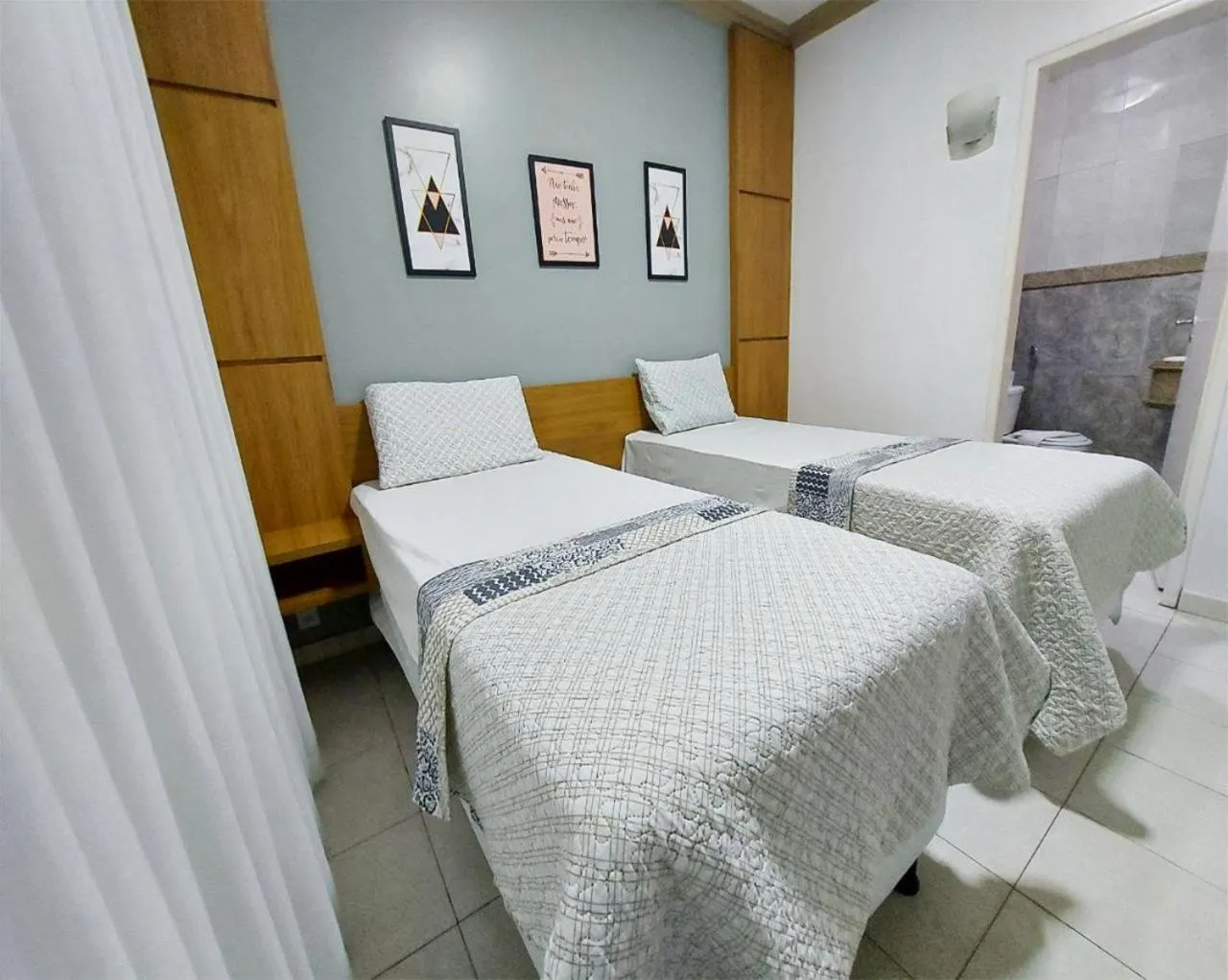 Bed in Hotel Pequeno Principe