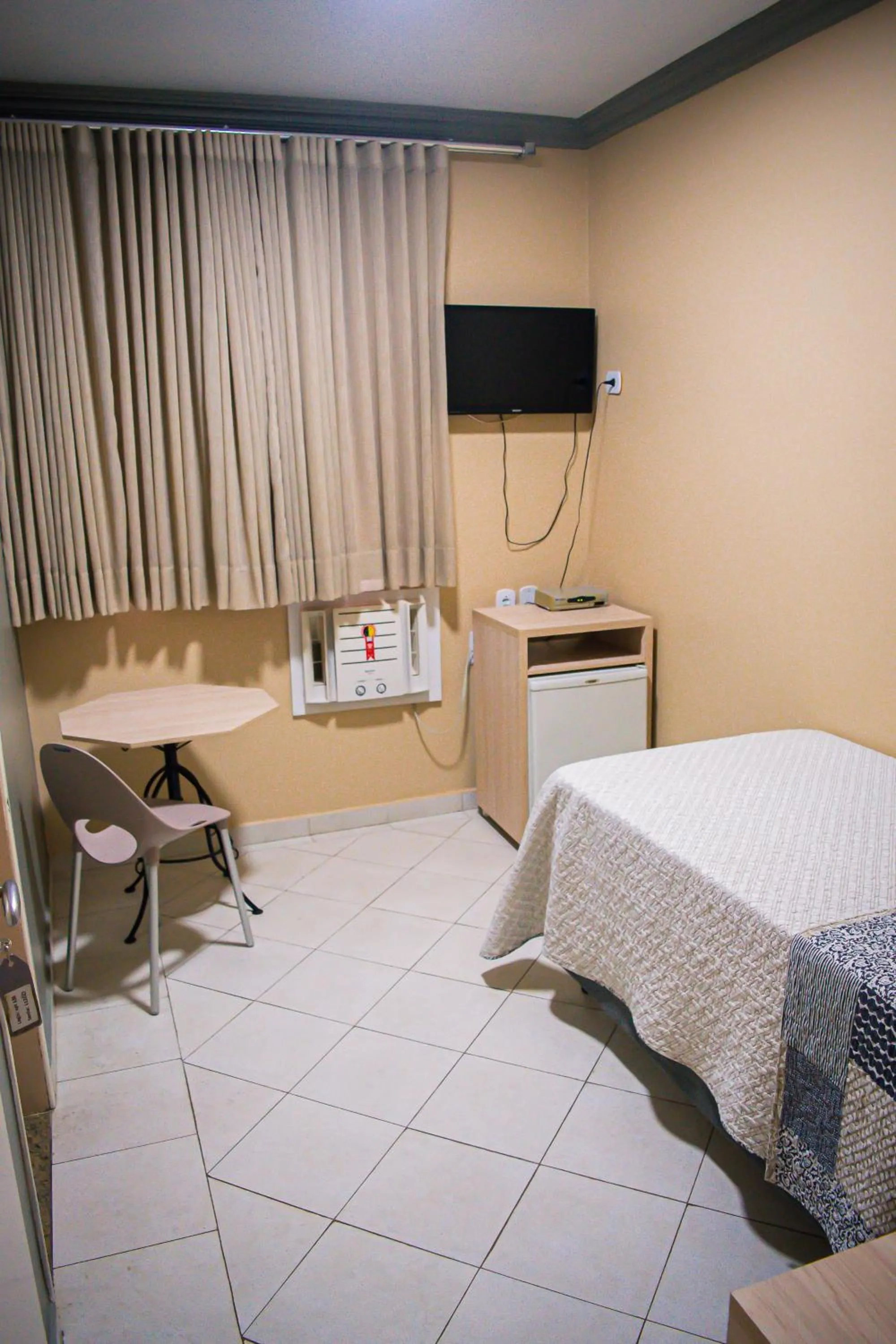 Bed in Hotel Pequeno Principe