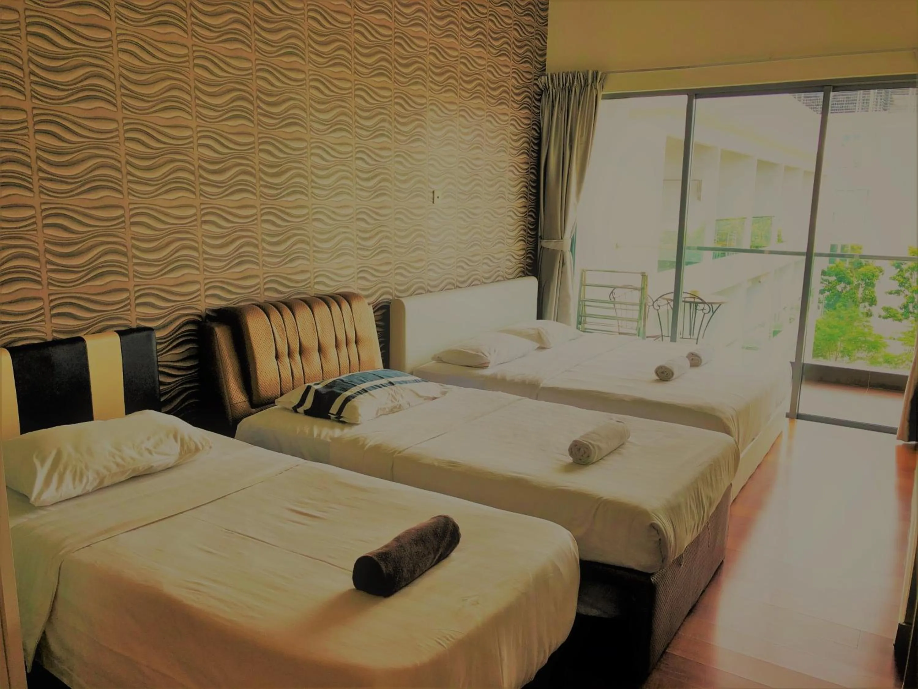 Photo of the whole room, Bed in Borneo Coastal Residence @ IMAGO Mall