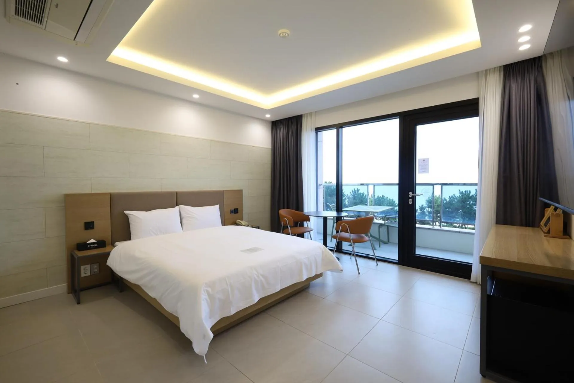 Bed in SongJeong Olla Hotel