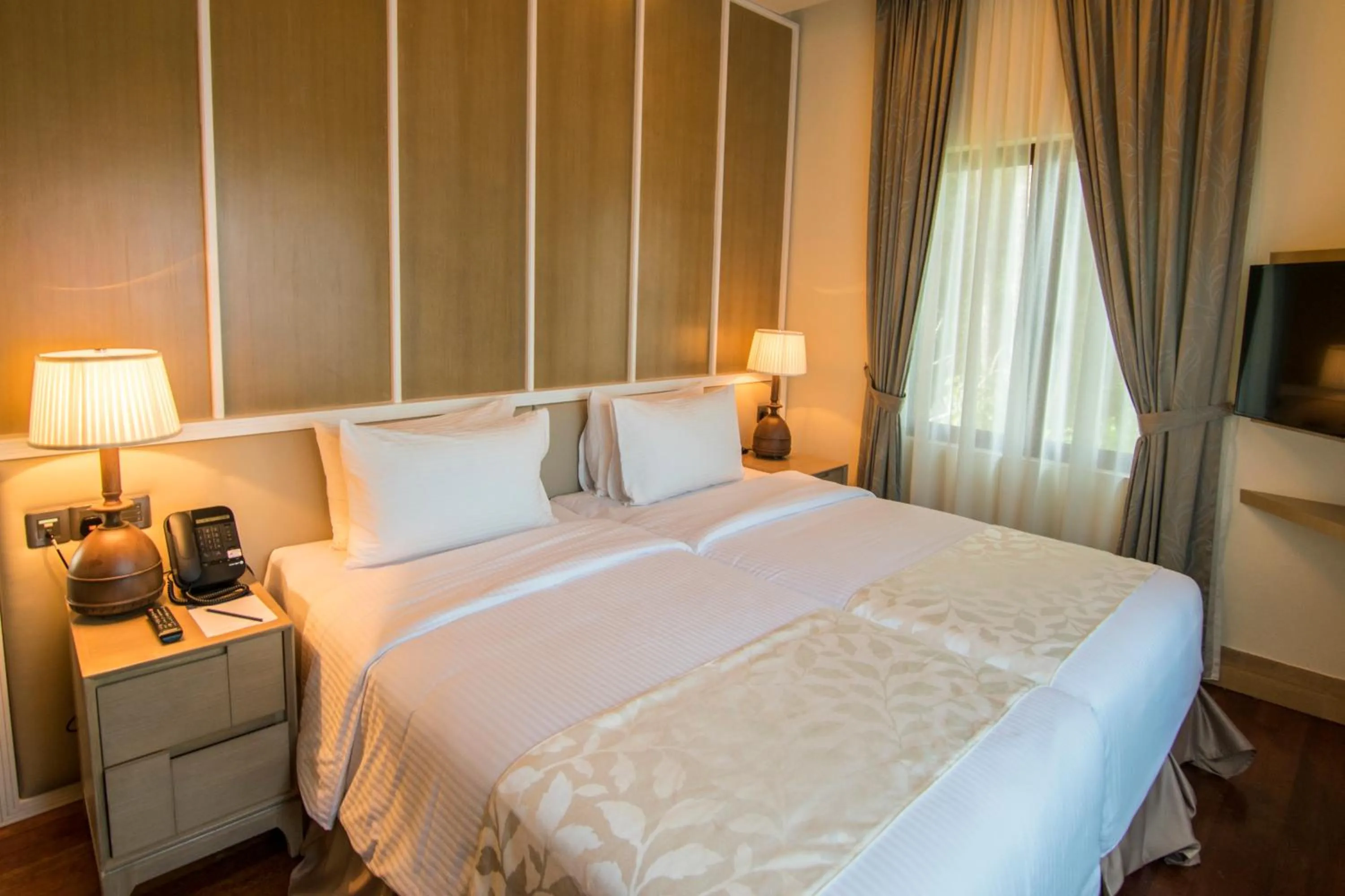 Bed in Royale Chulan Cherating Villa