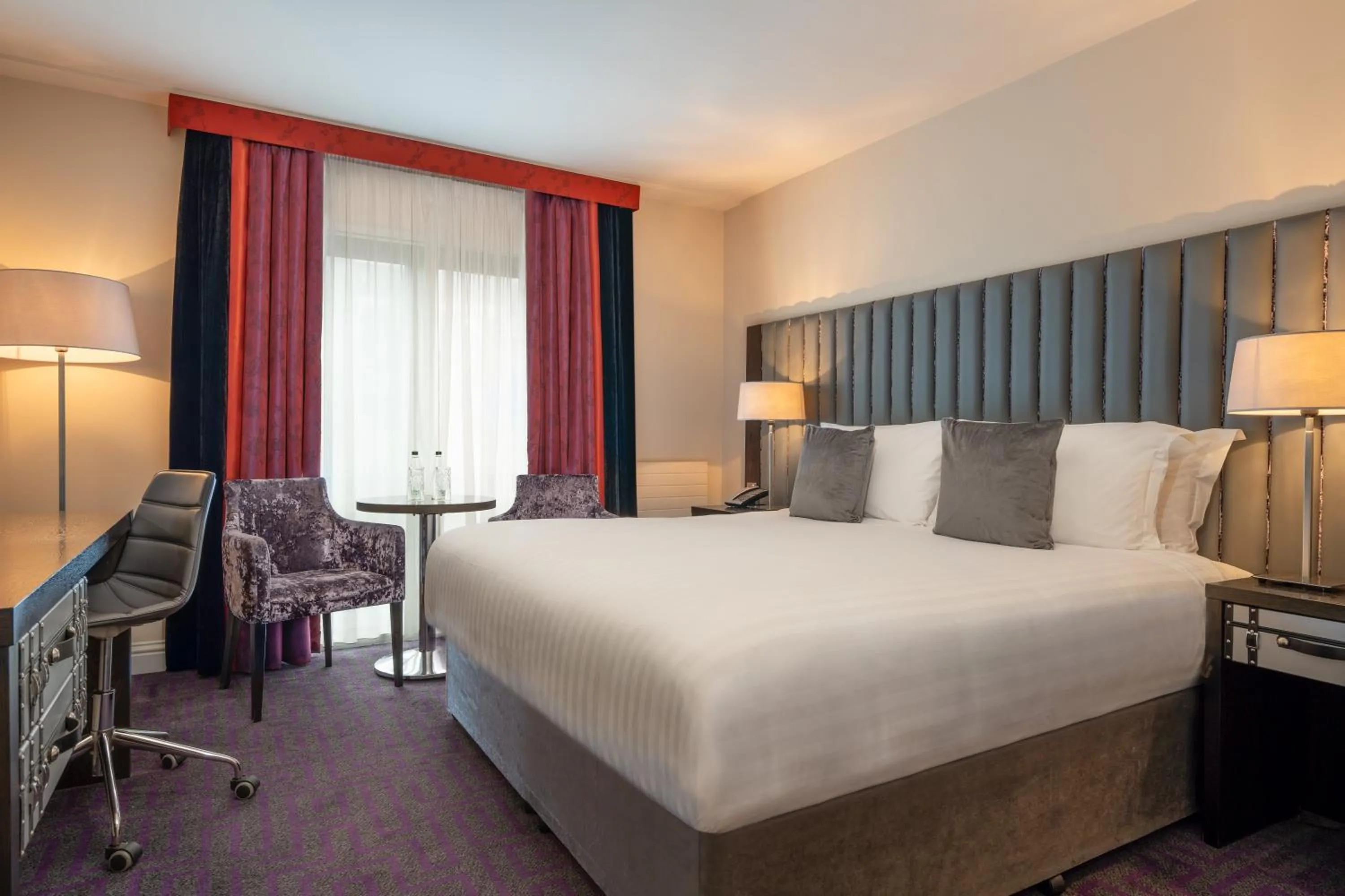 Bed in The Trinity City Hotel