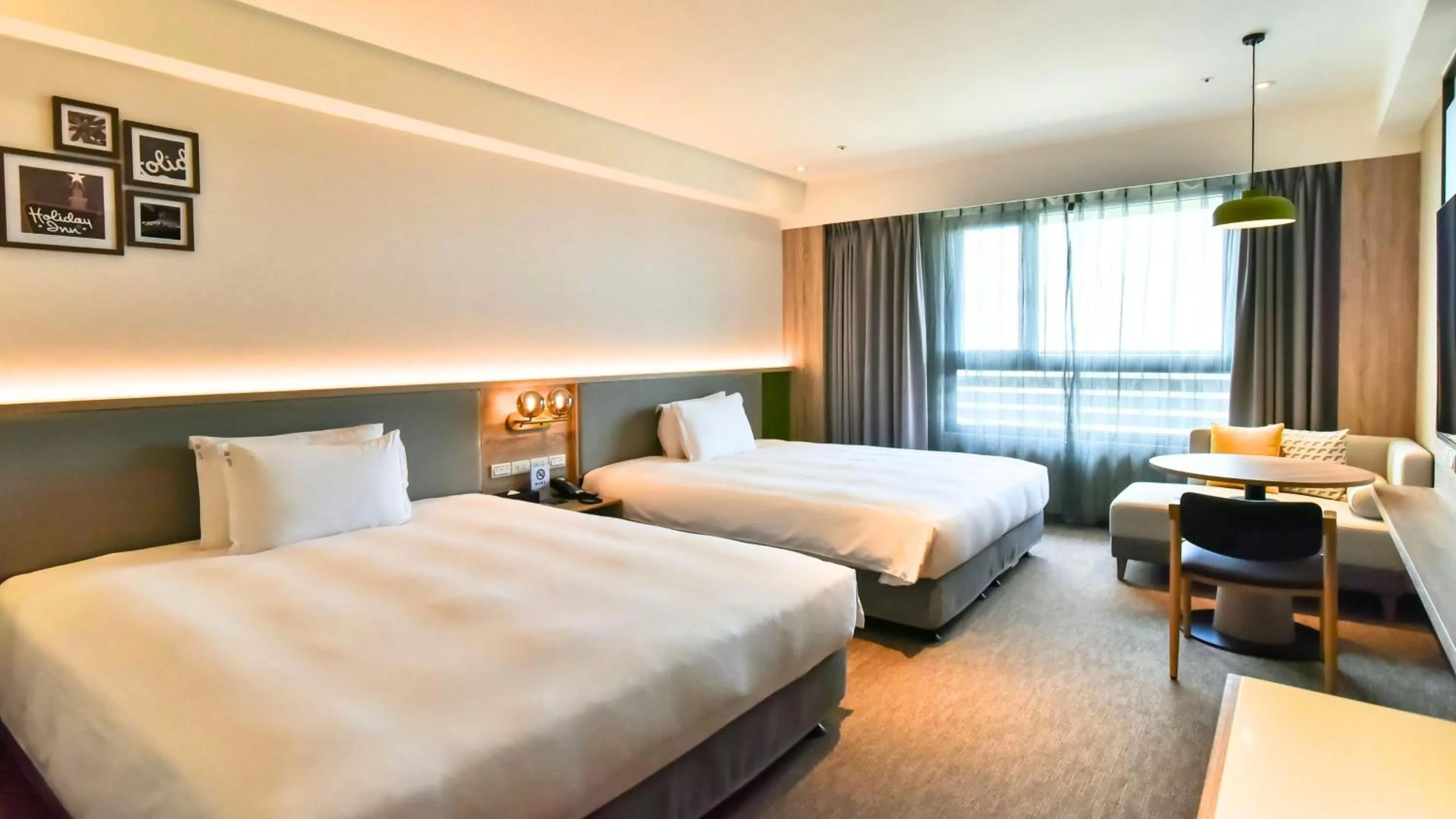 Photo of the whole room, Bed in Holiday Inn Taoyuan Airport by IHG