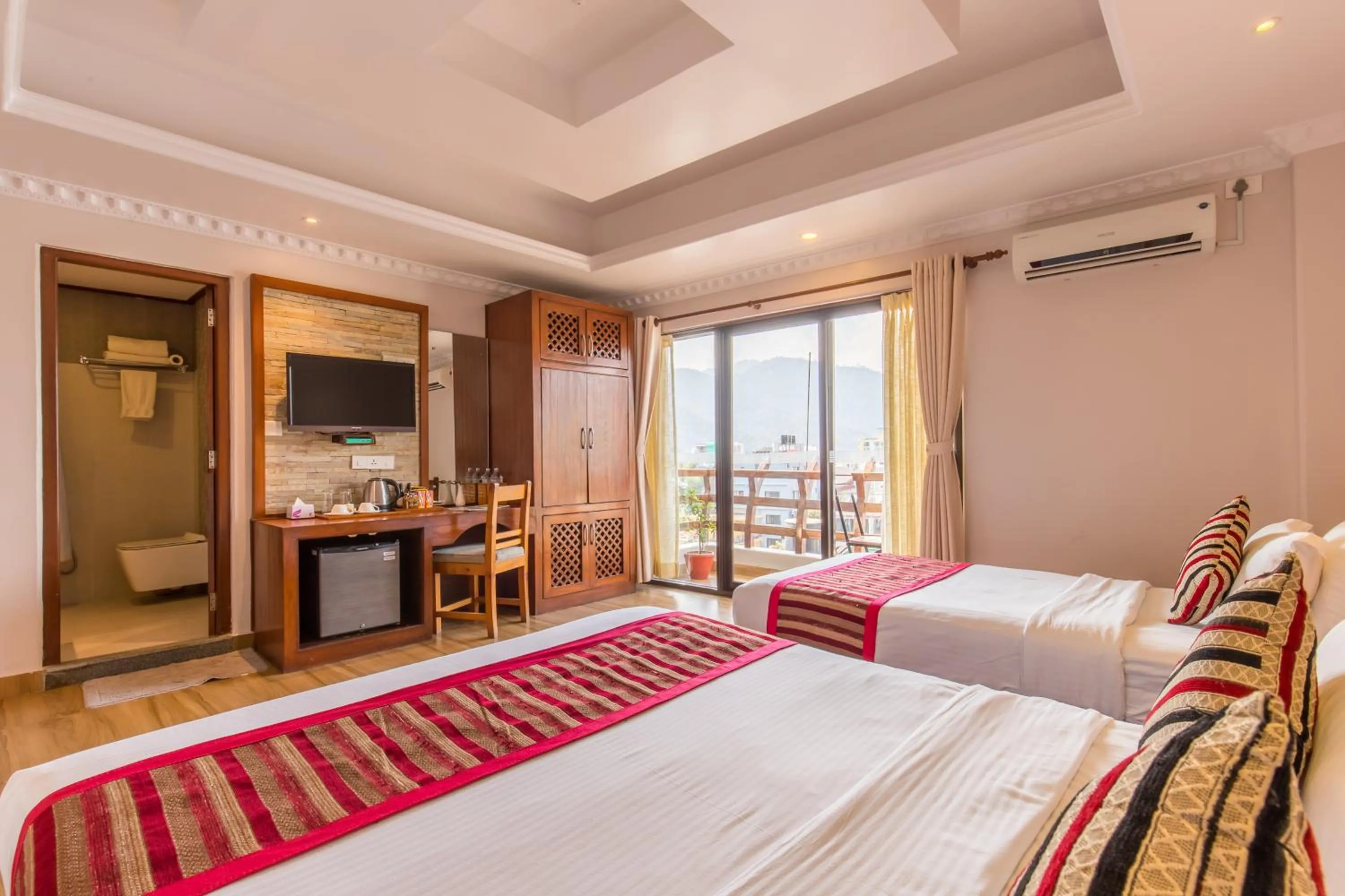 Bed in Kuti Resort & Spa