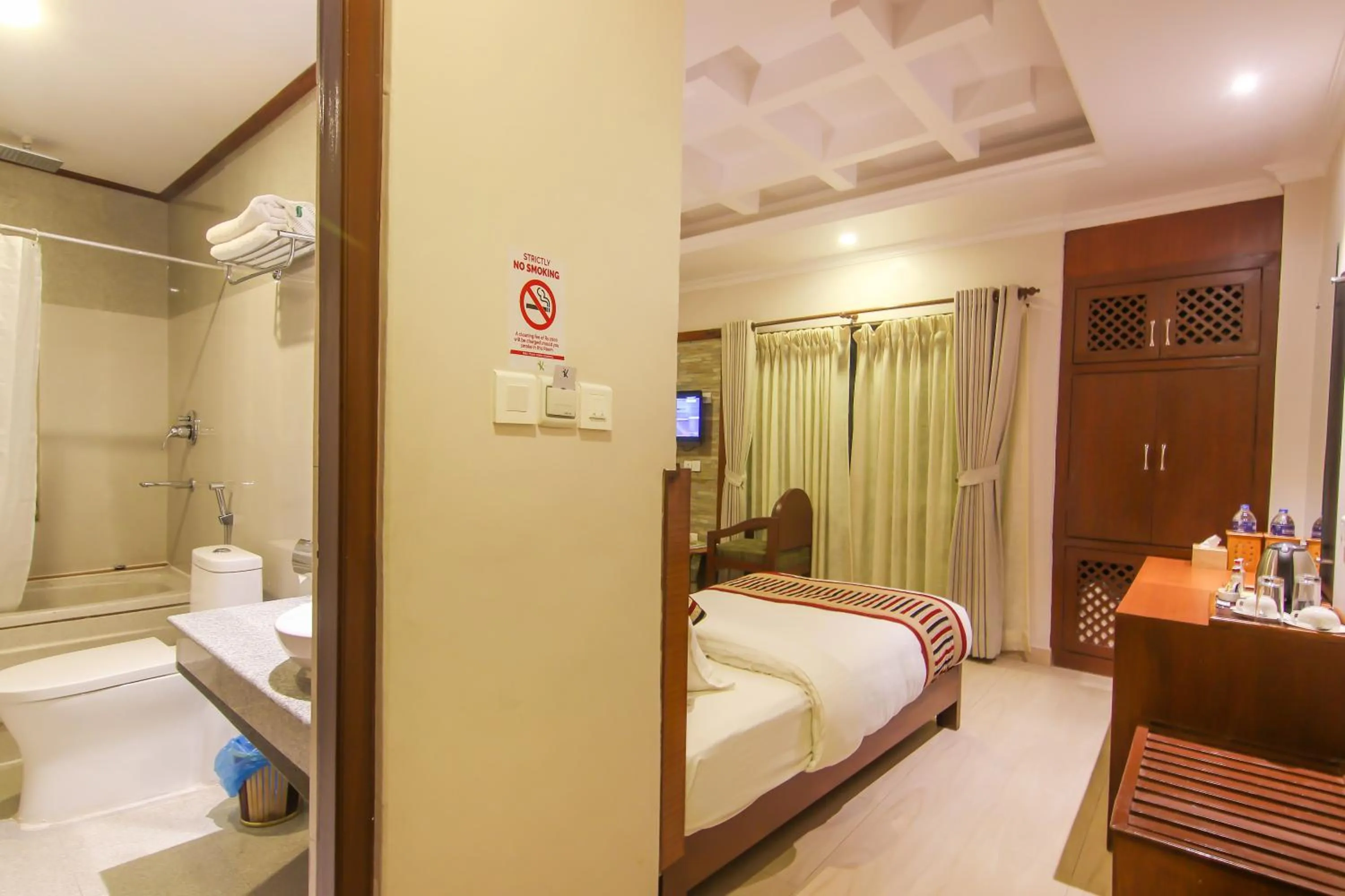 Bed in Kuti Resort & Spa