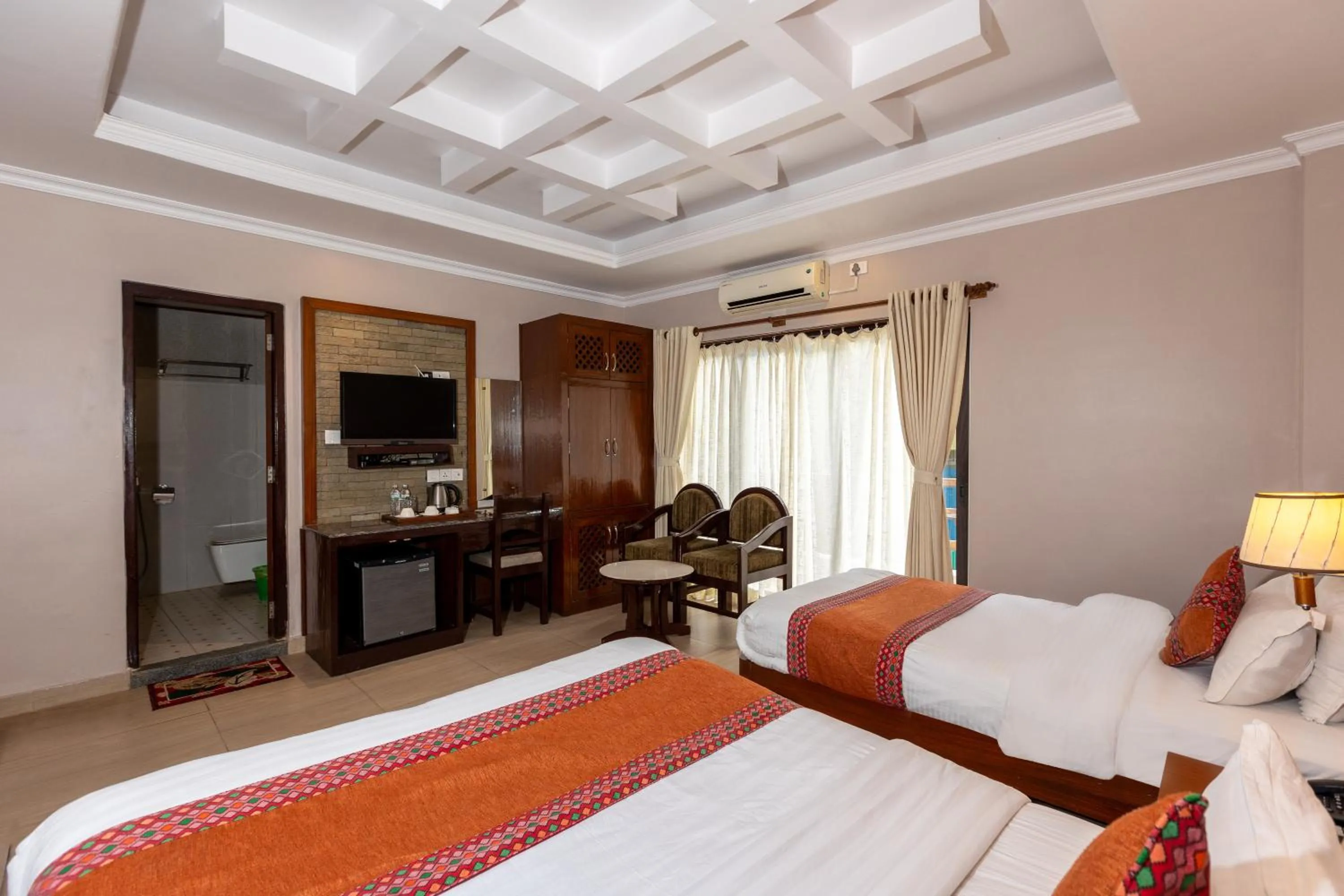 Bed in Kuti Resort & Spa