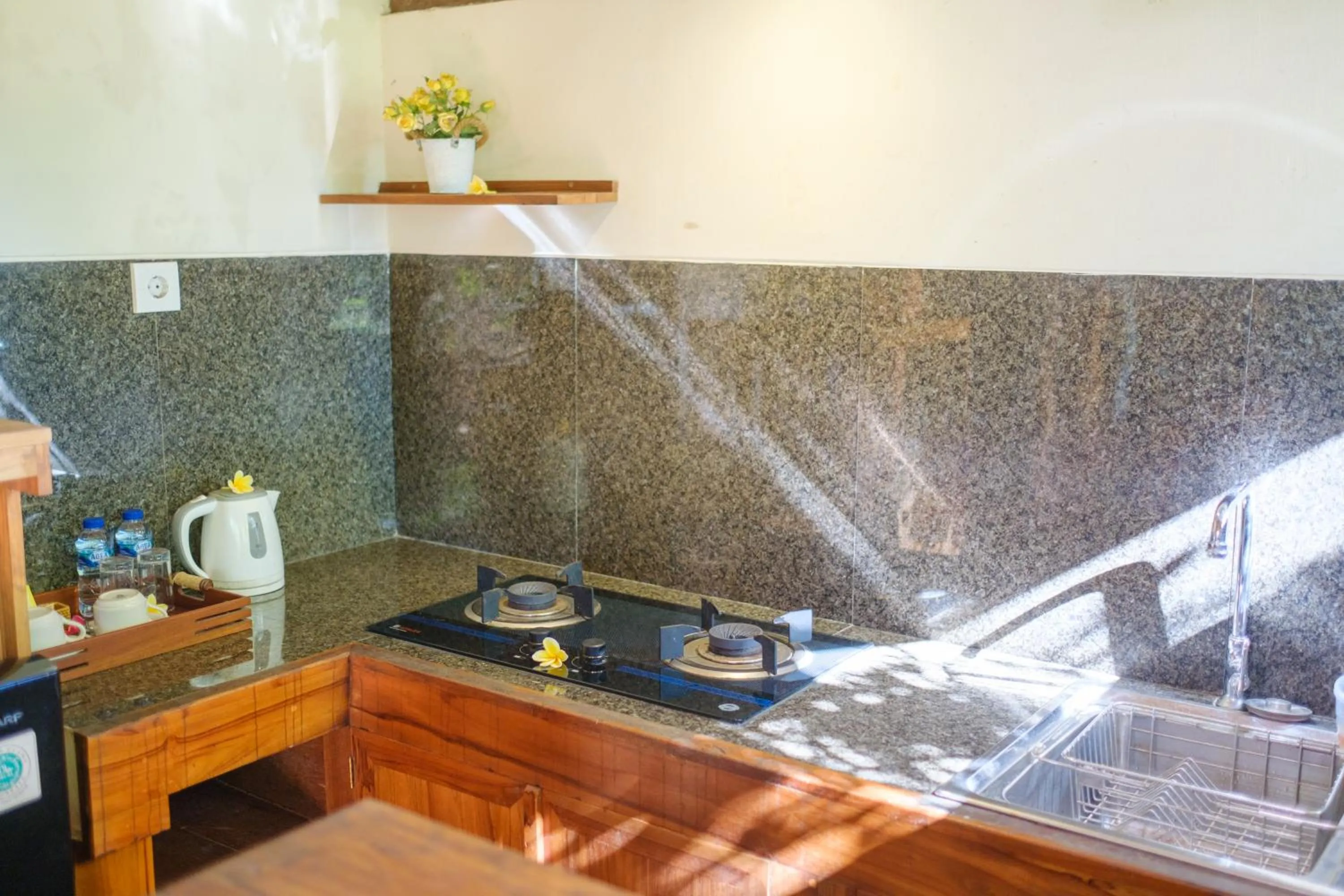 Kitchen or kitchenette in Puri Kobot