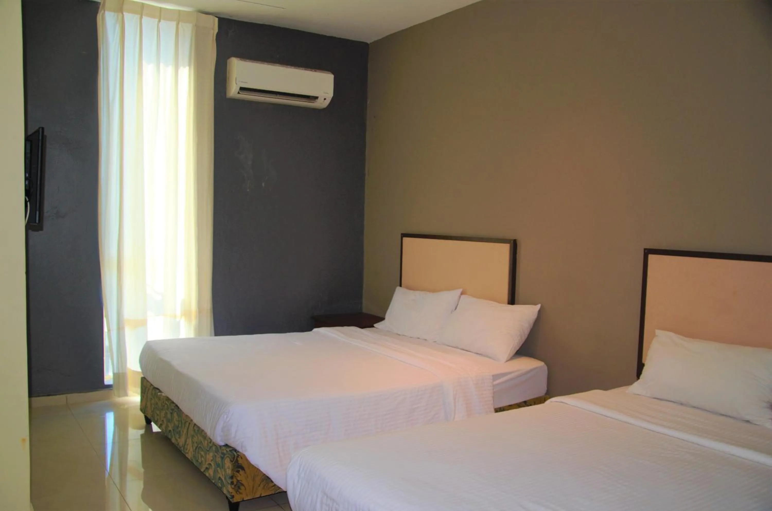 Bed in Senrose Hotel Kuantan