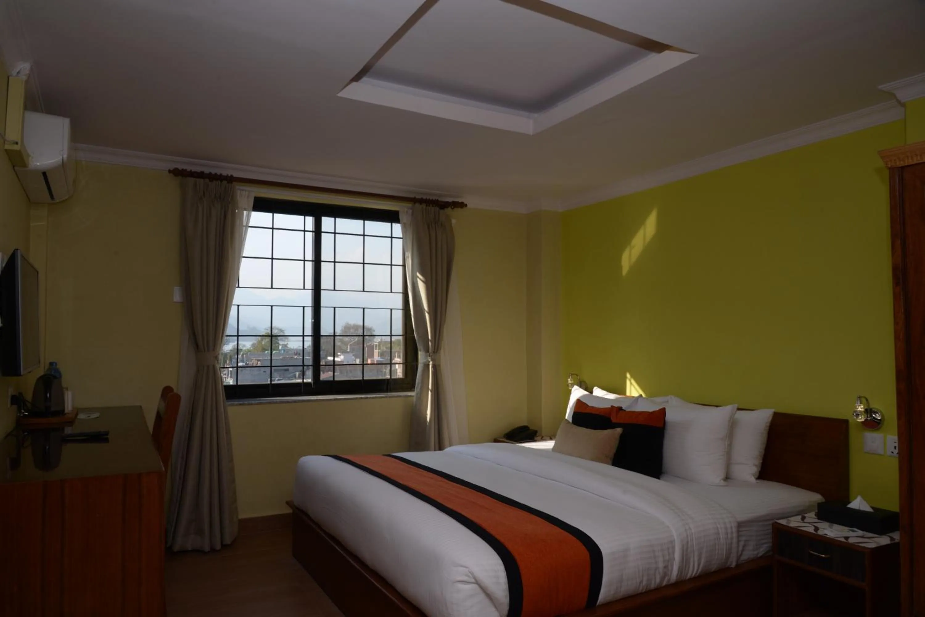 Bed in Hotel Raniban Arcade