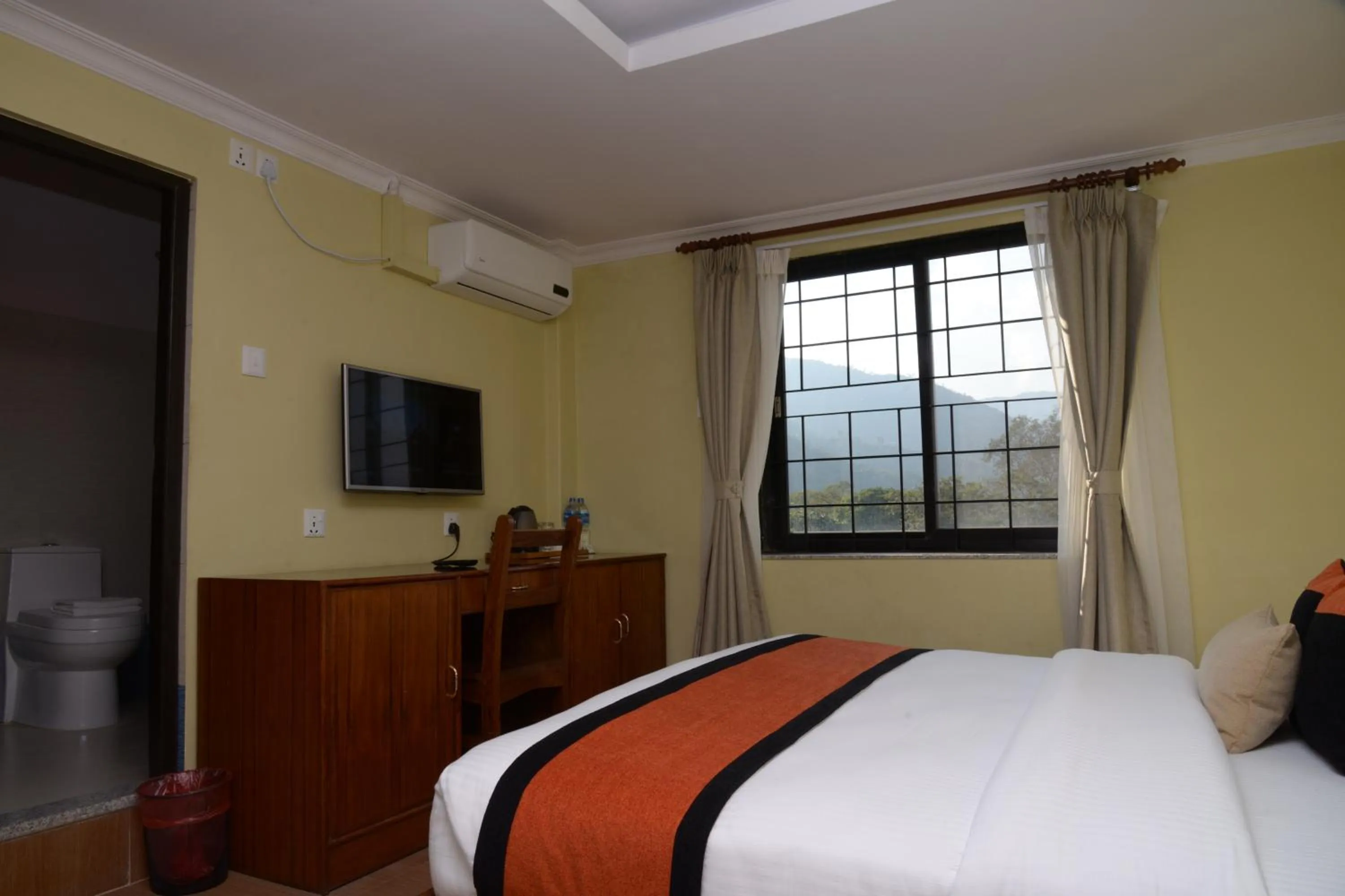 Bed in Hotel Raniban Arcade