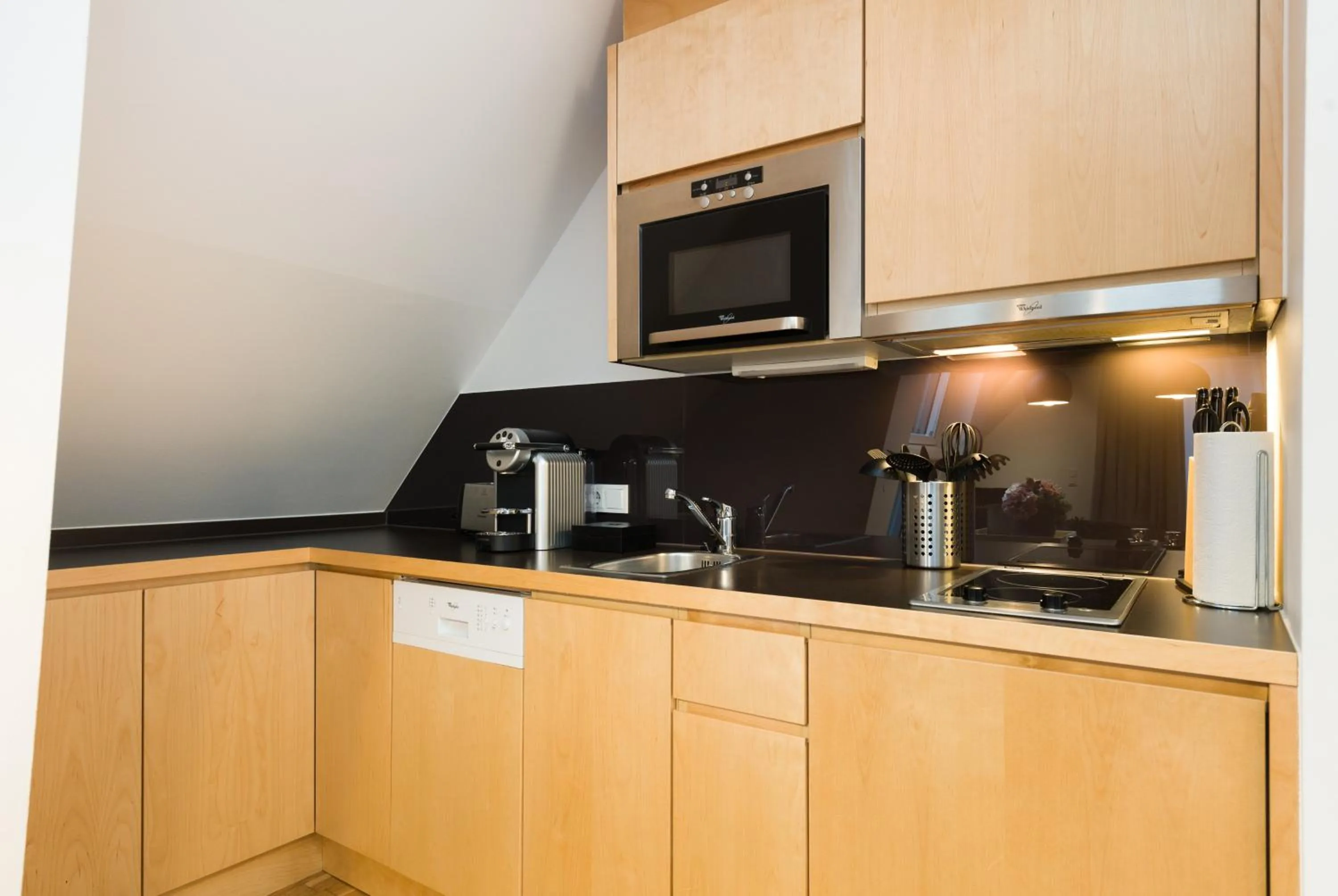 Kitchen or kitchenette in RAFAEL KAISER - Premium Apartments City Centre - Contactless Check-In
