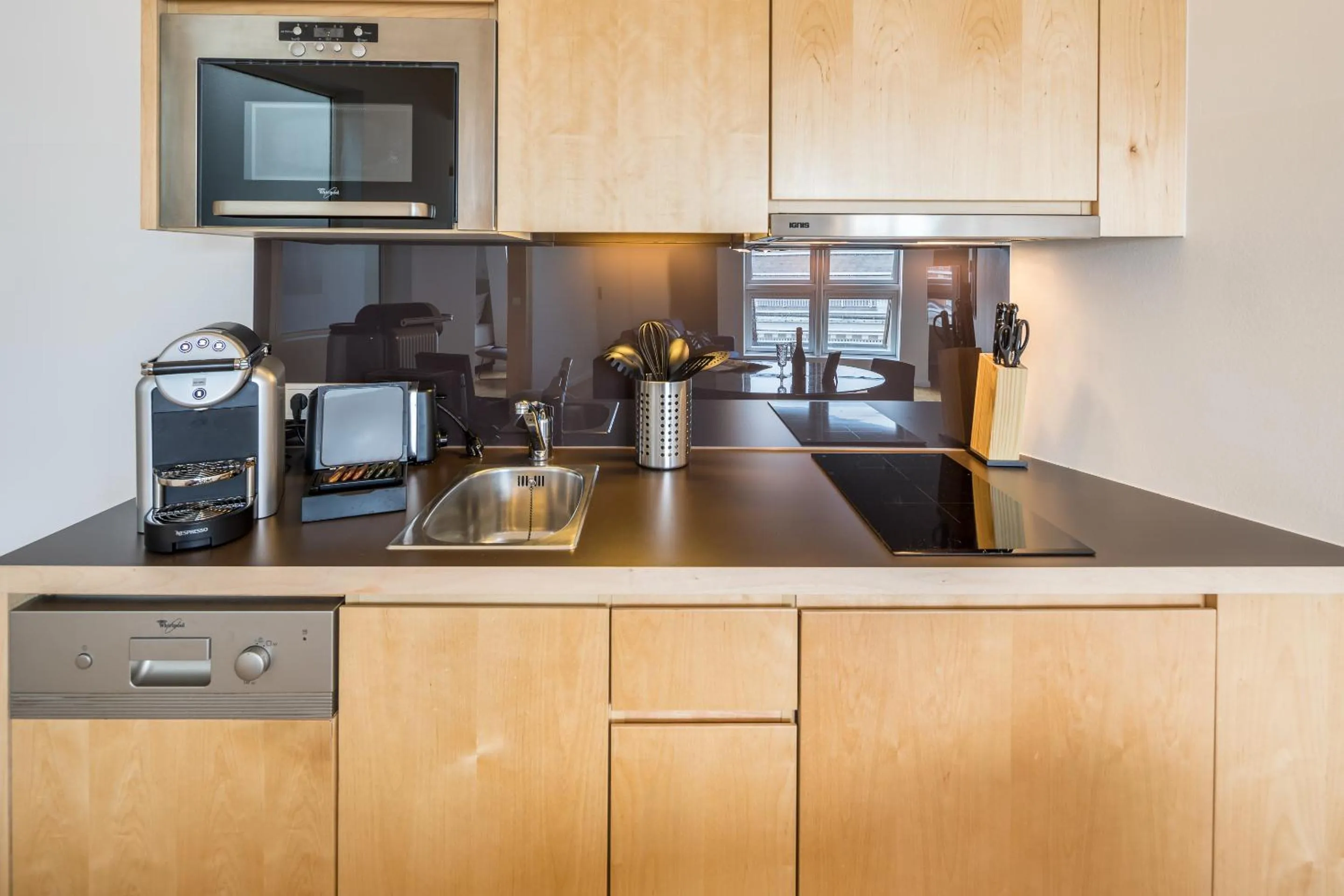 Kitchen or kitchenette in RAFAEL KAISER - Premium Apartments City Centre - Contactless Check-In