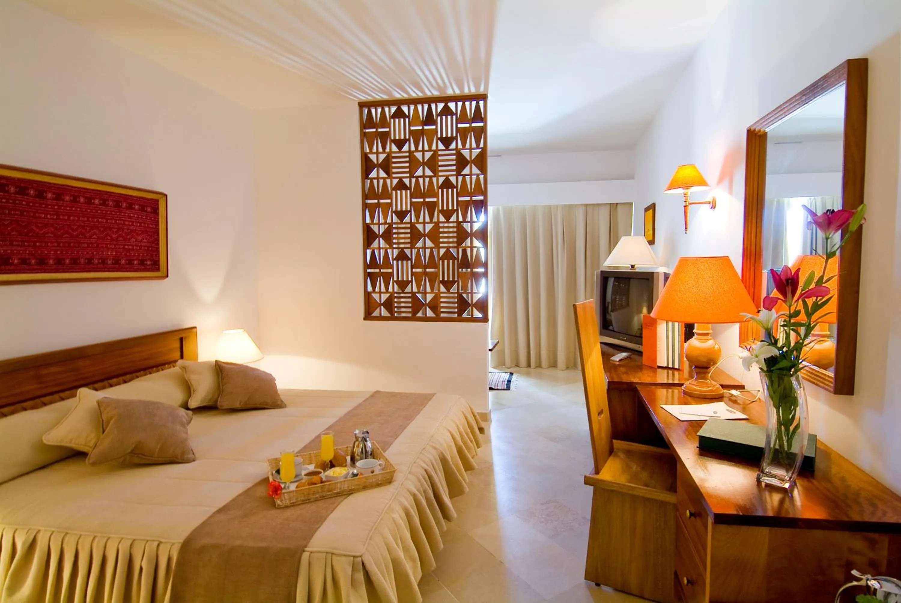 Bed in The Orangers Beach Resort and Bungalows All Inclusive