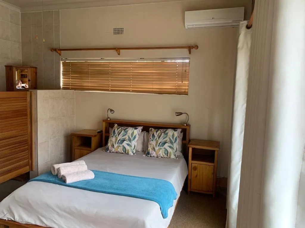 Bed in Nkwasi Lodge