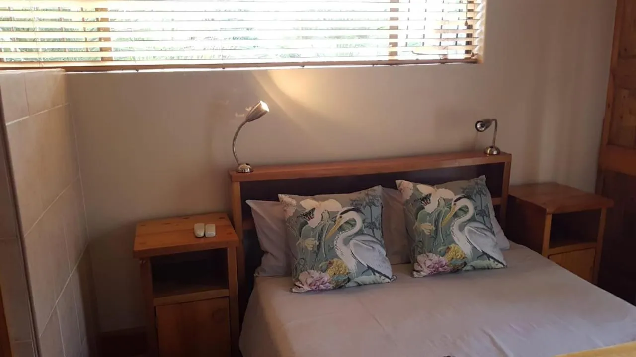 Bed in Nkwasi Lodge