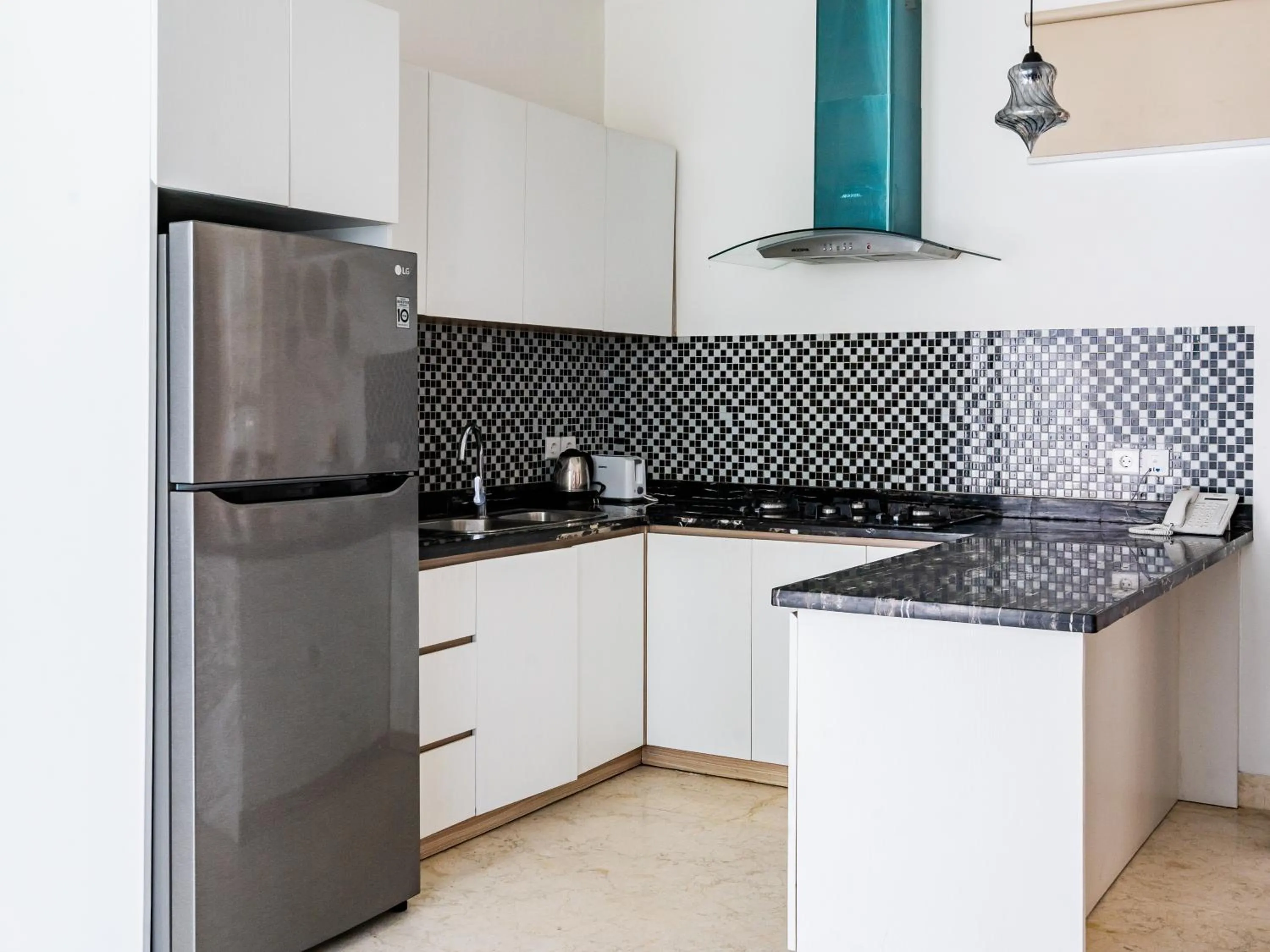 Kitchen or kitchenette in Bali Residence Villa