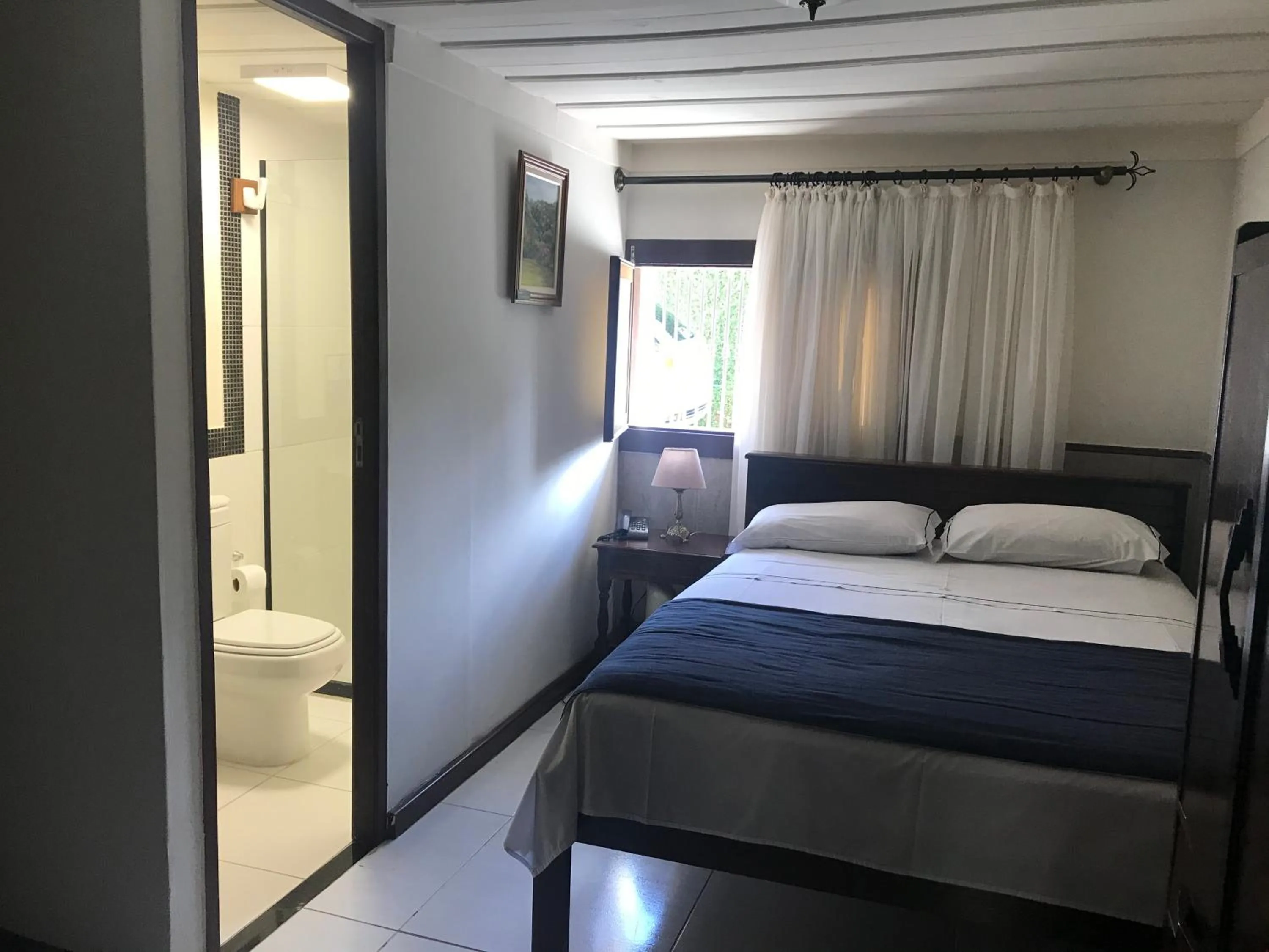 Bedroom, Bed in Pousada Dom Petrópolis