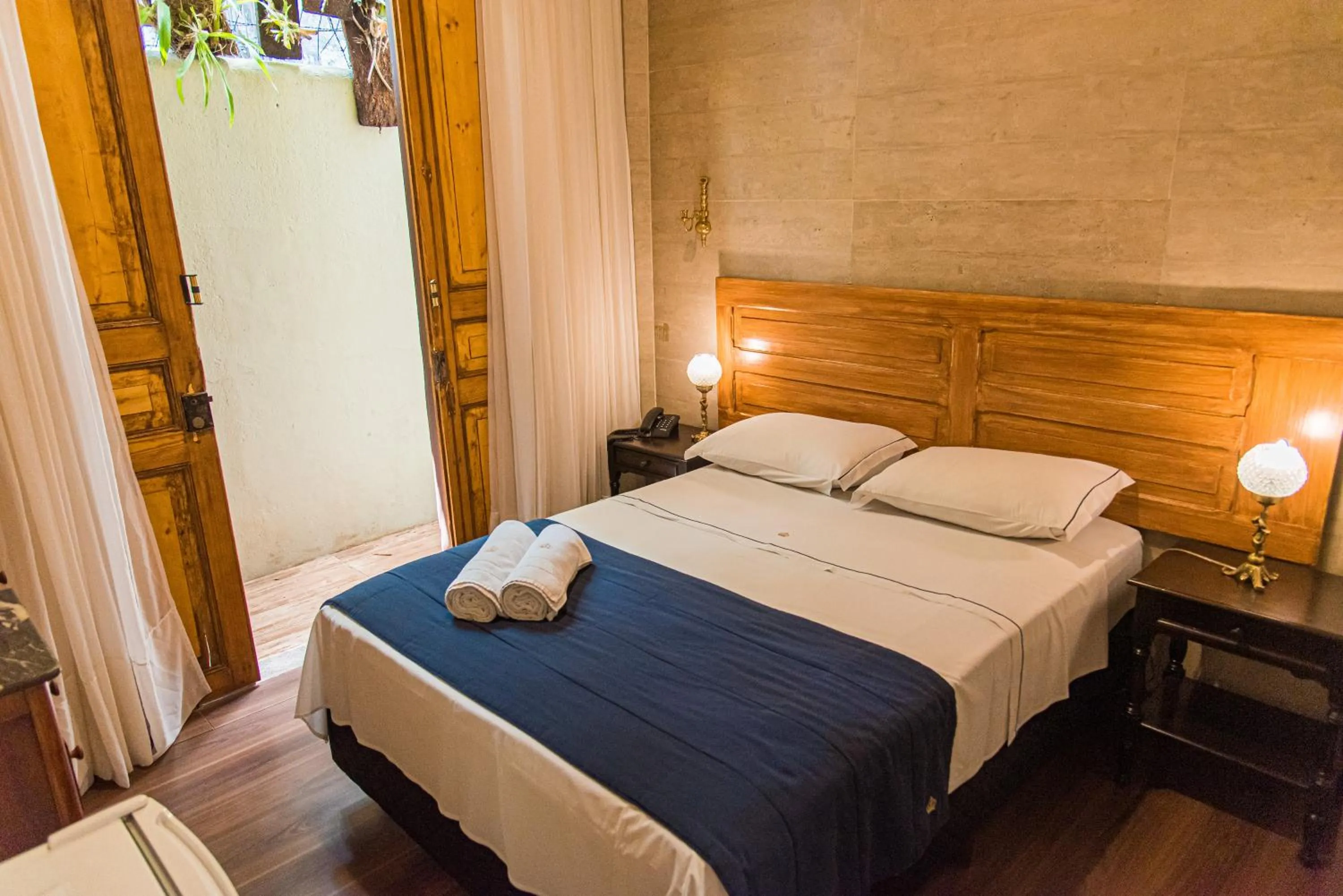 Bedroom, Bed in Pousada Dom Petrópolis