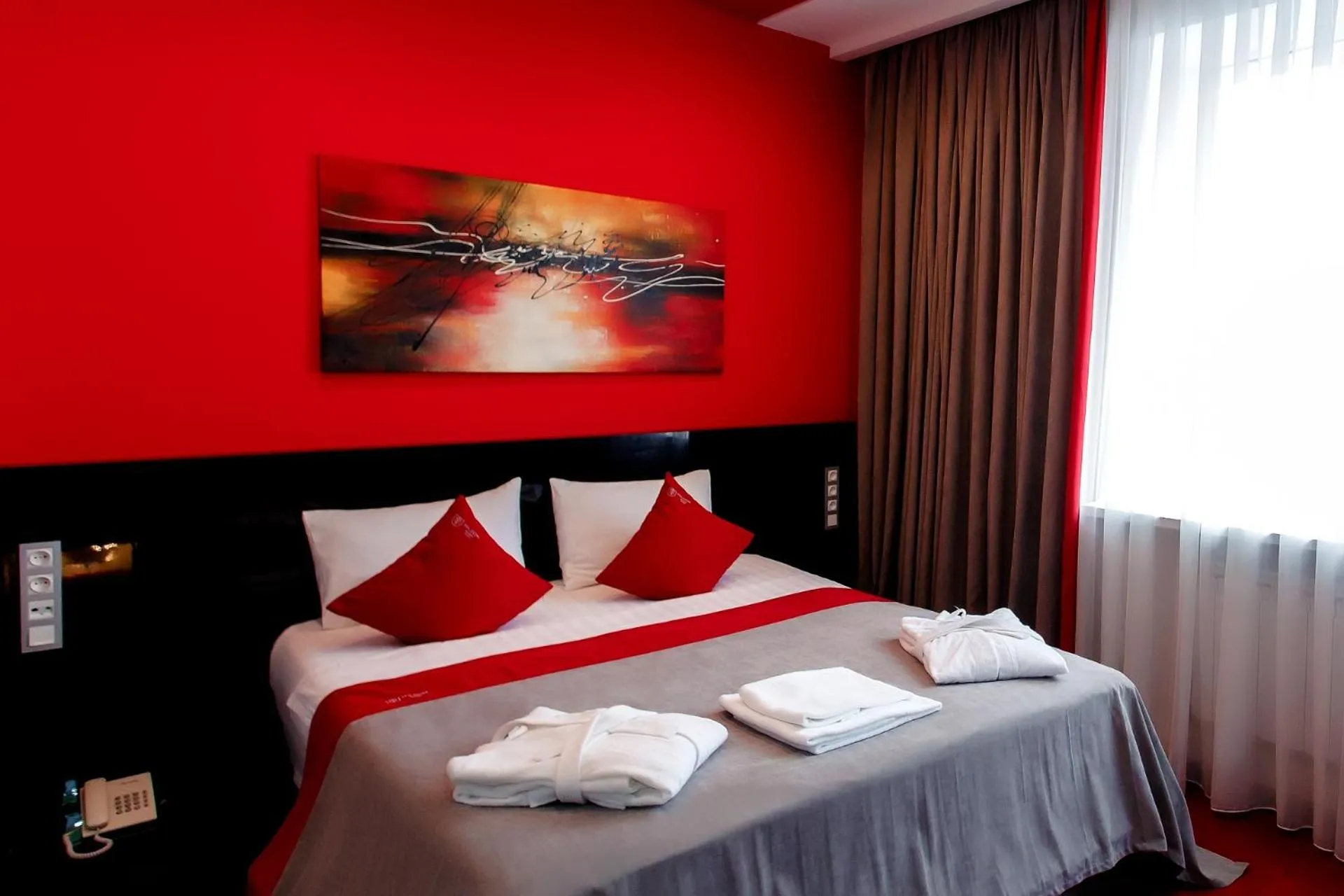 Bed in Mildom Premium Hotel