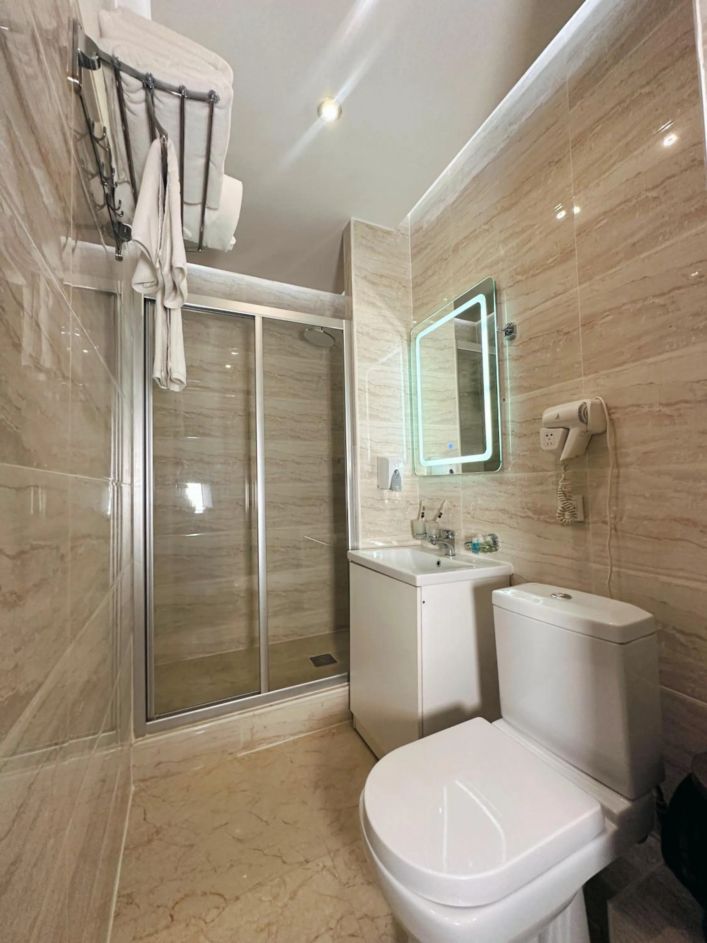 Property building in Mildom Premium Hotel