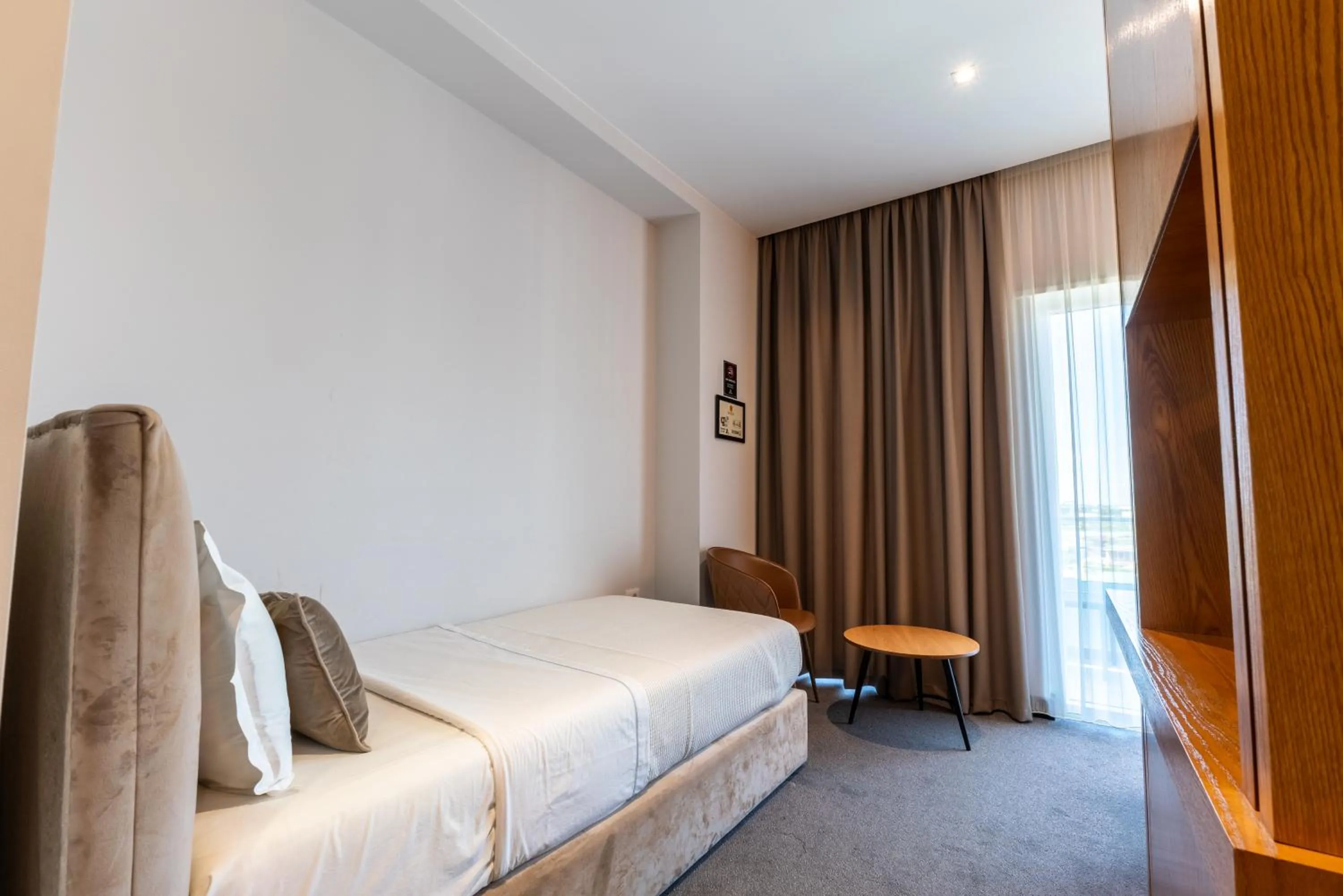 Bed in Hotel Delta Premium