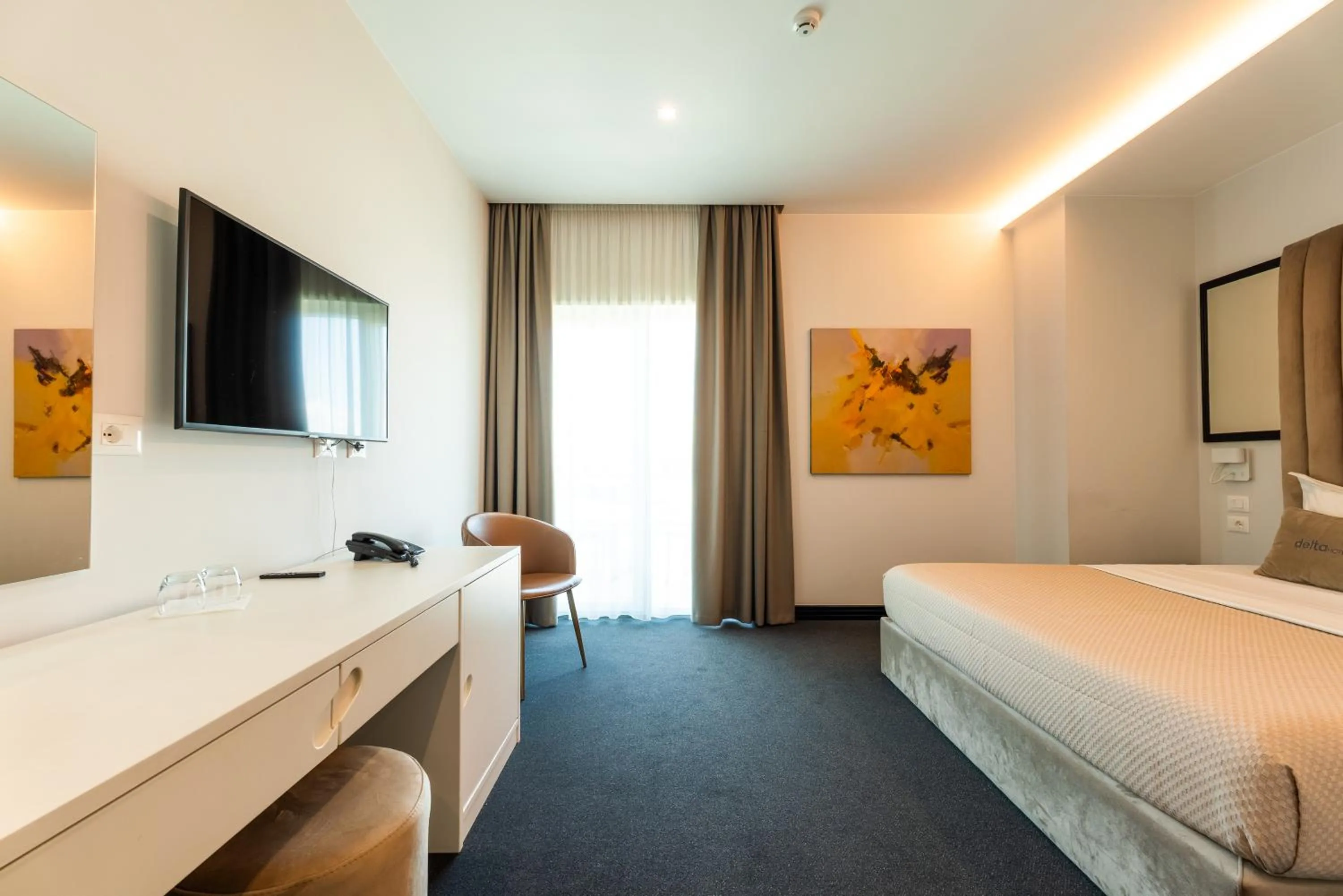 Bed in Hotel Delta Premium